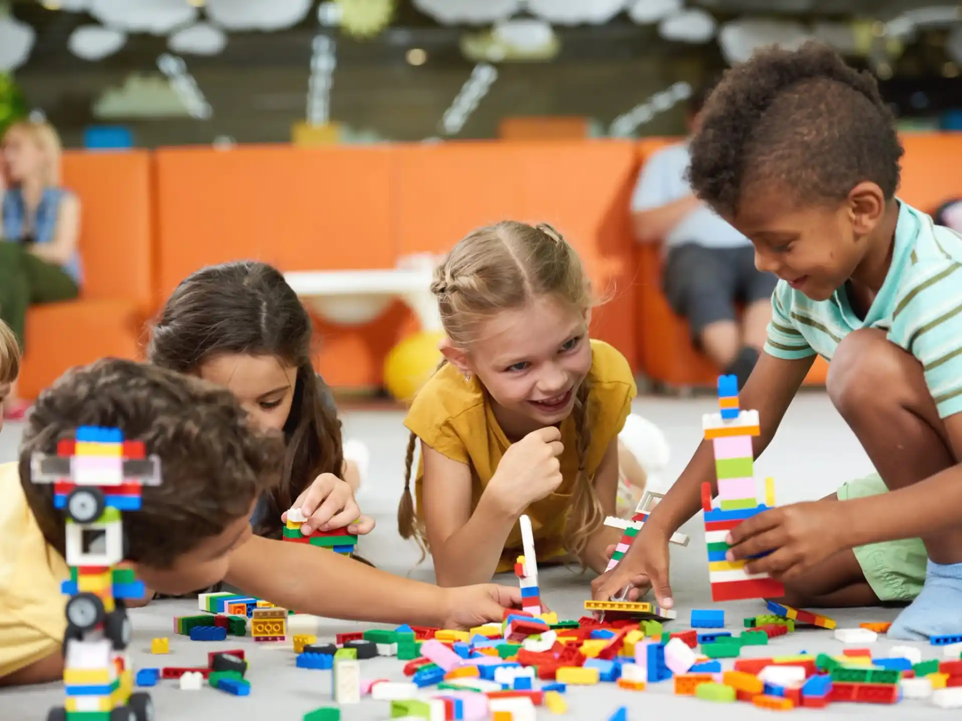 a group of children playing with toys
