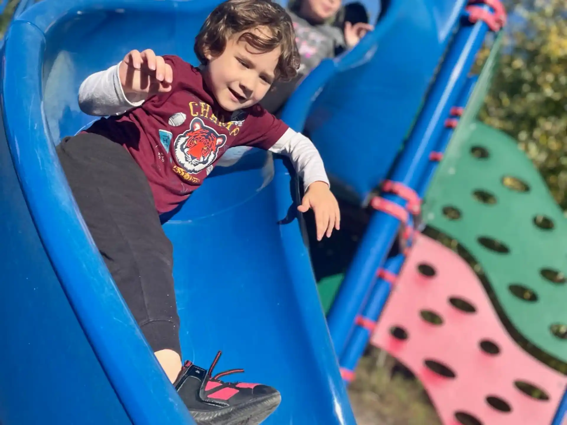 a boy on a slide
