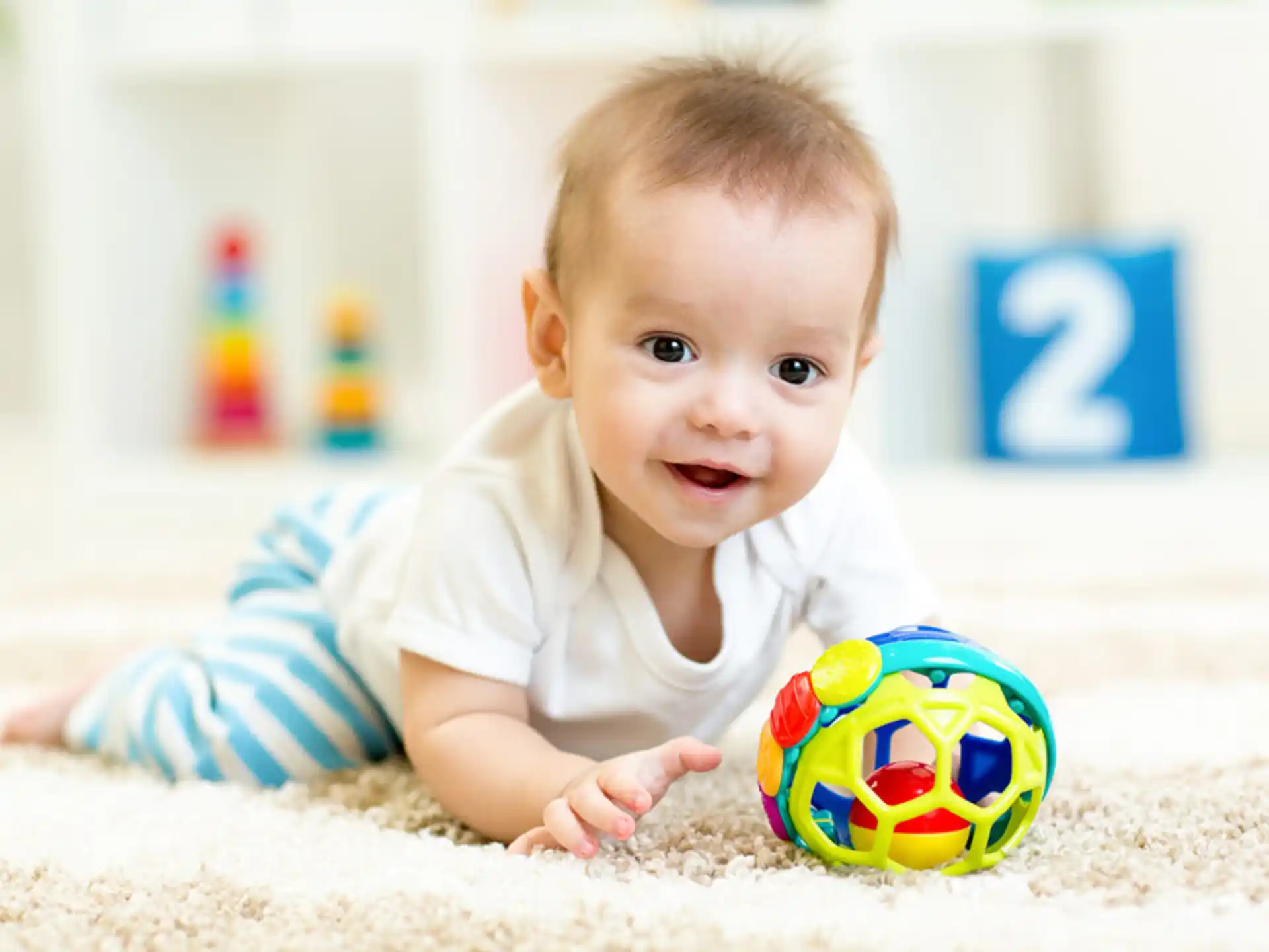 a baby crawling on the floor