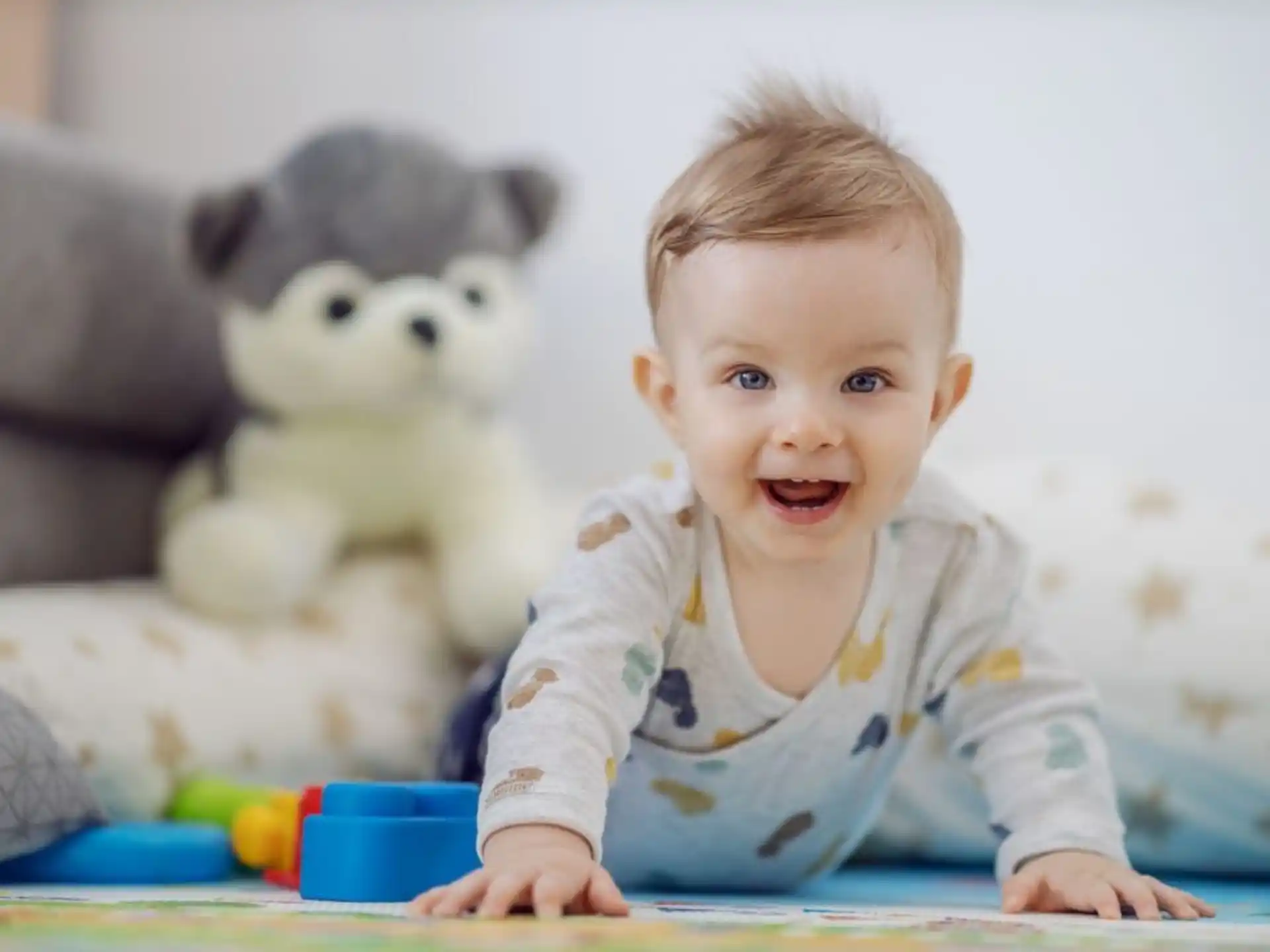 a baby with a mouse