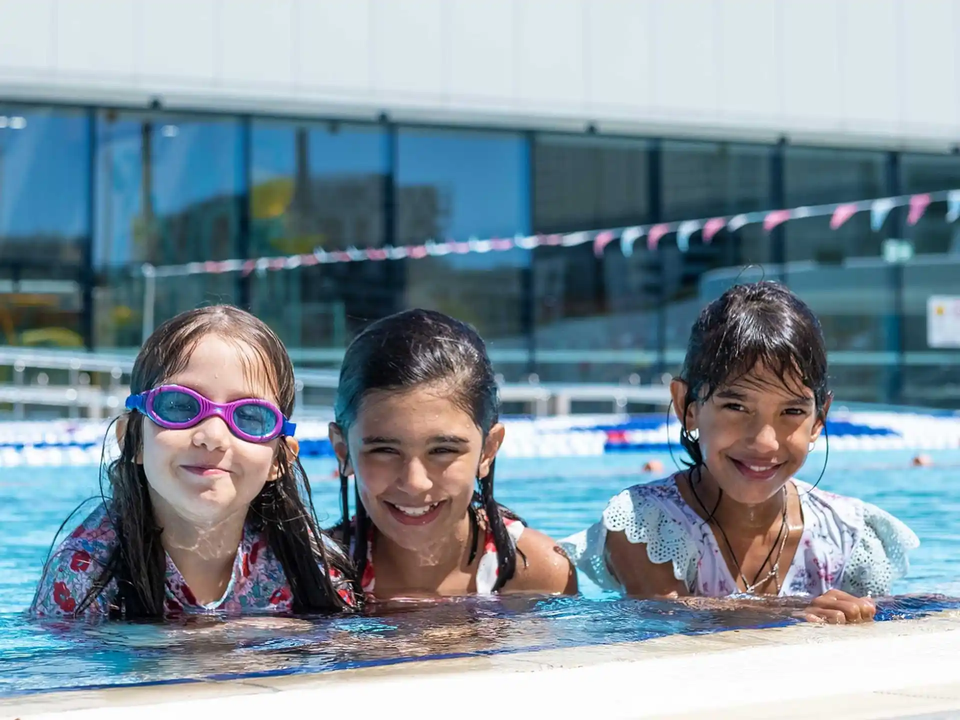 a group of girls in a pool