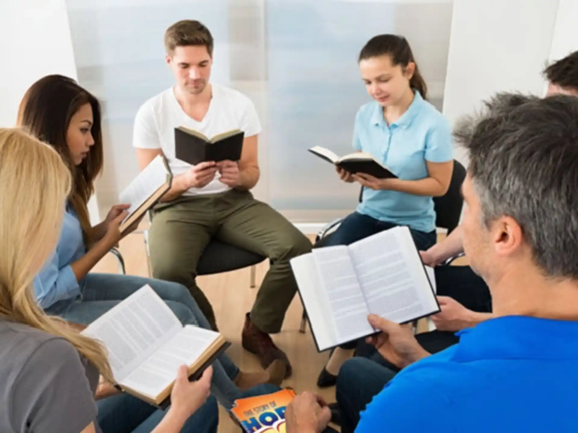a group of people sitting in a room