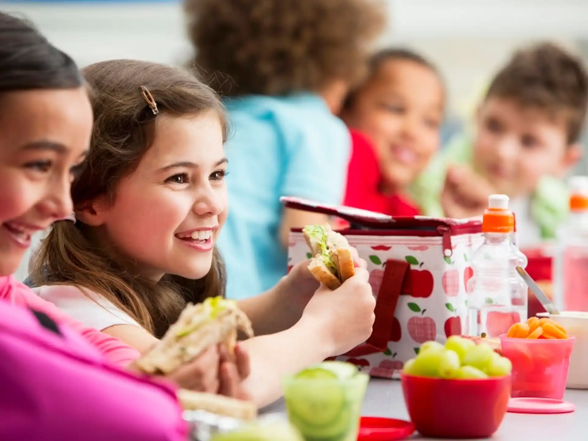 a group of kids eating