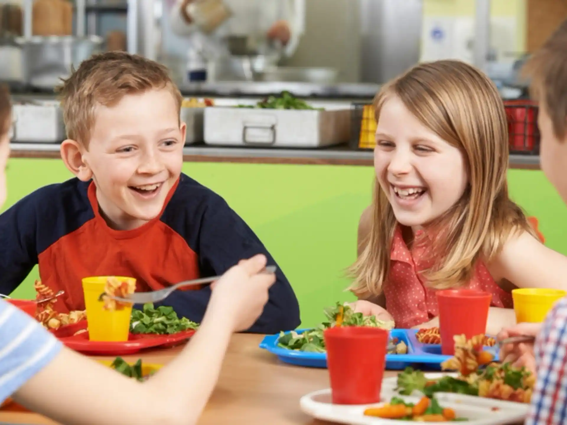 a group of people eating at a table