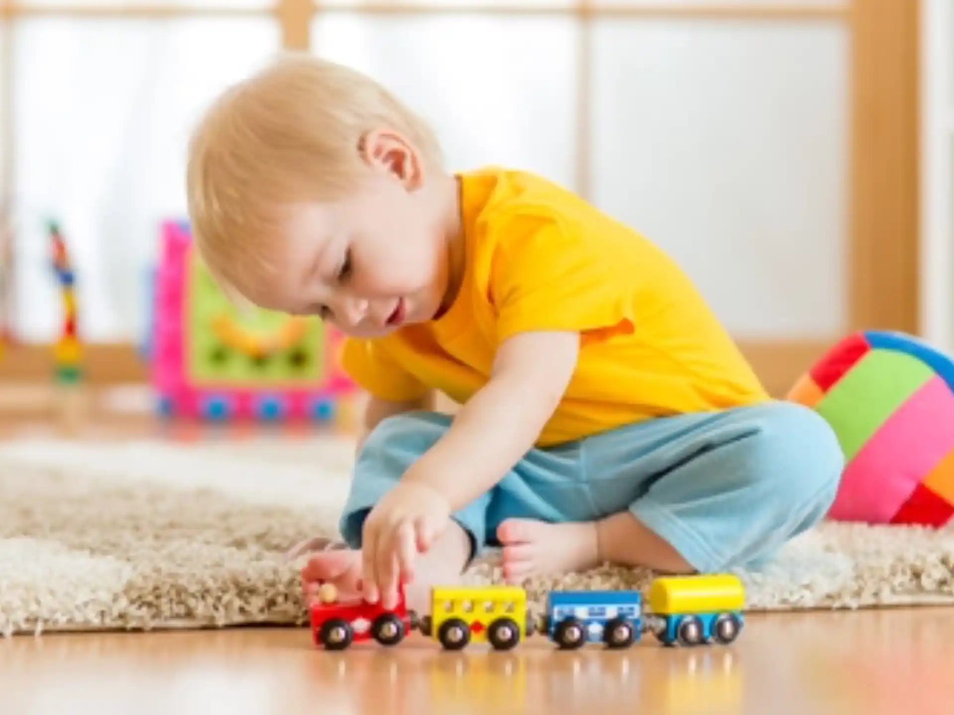 a baby playing with toys