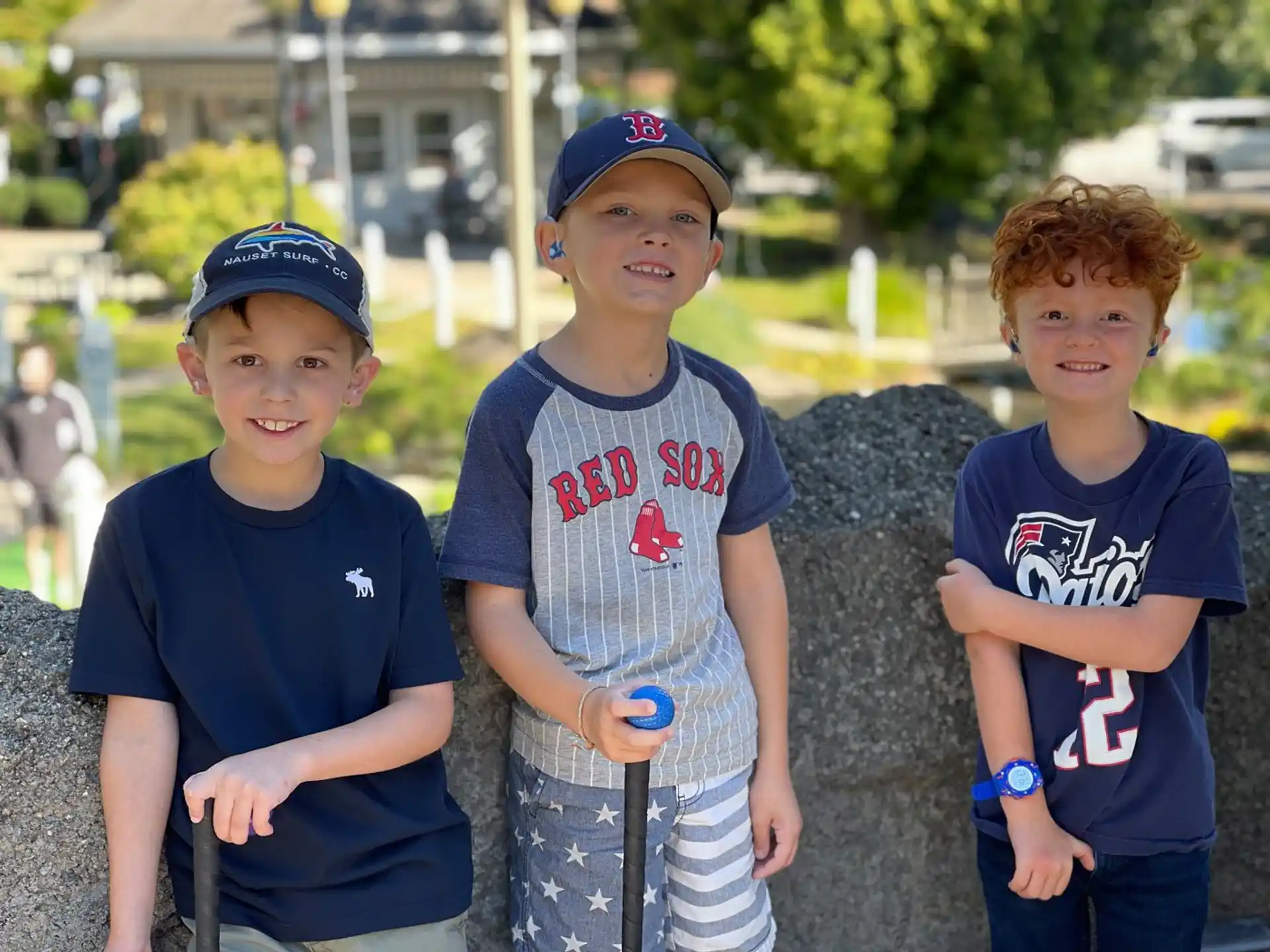 a group of boys posing for a picture