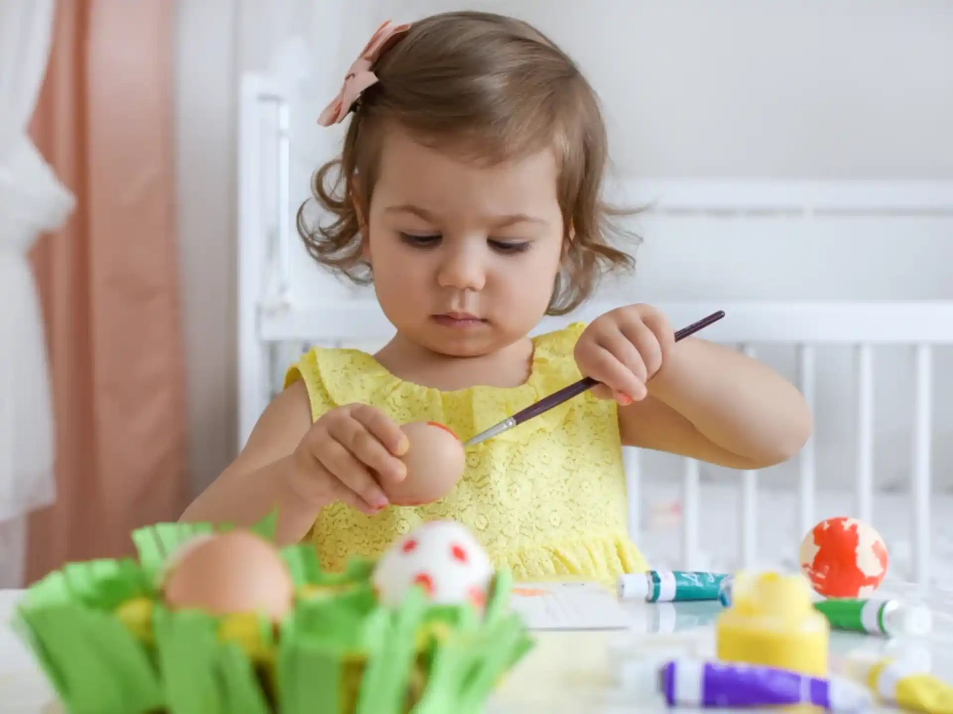 a little girl eating cake