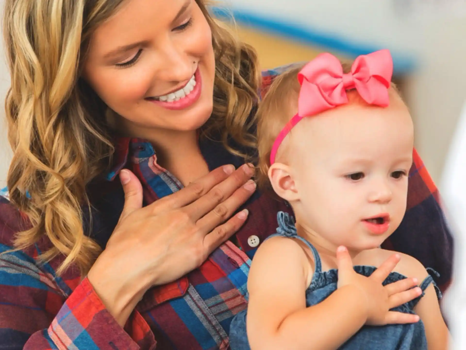 a person holding a baby