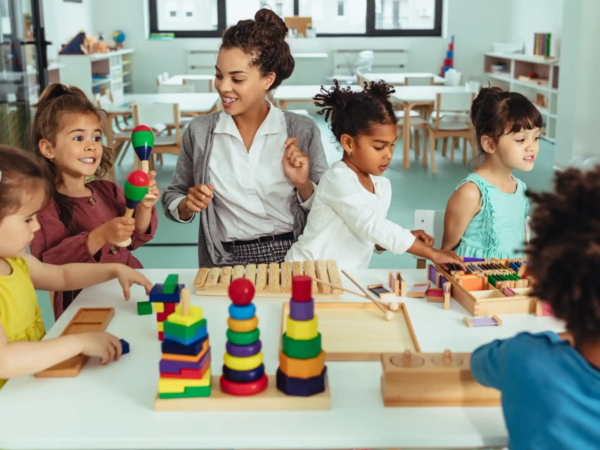 a group of children playing with toys