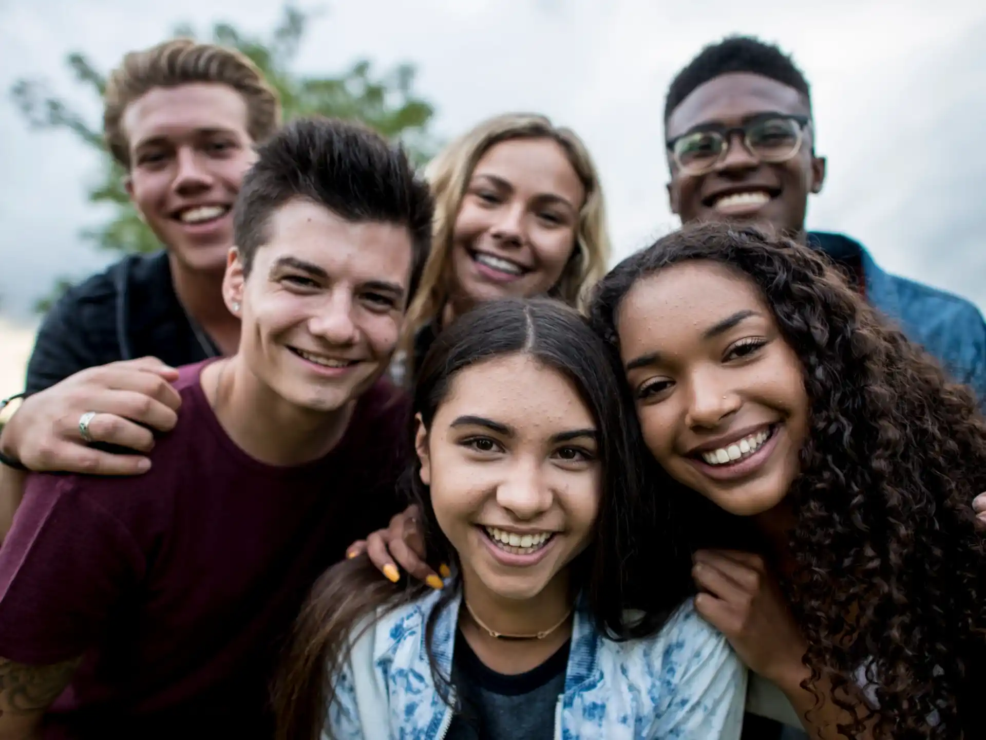 a group of people posing for a photo
