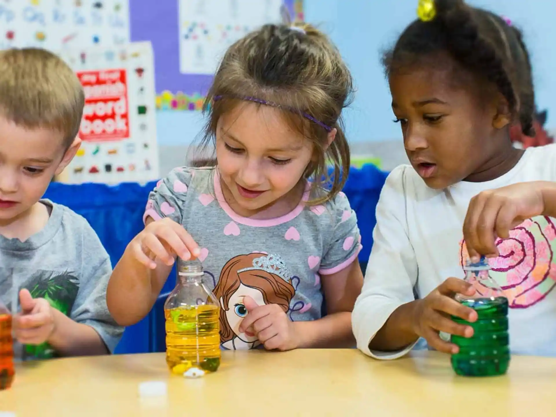 a group of children playing with toys