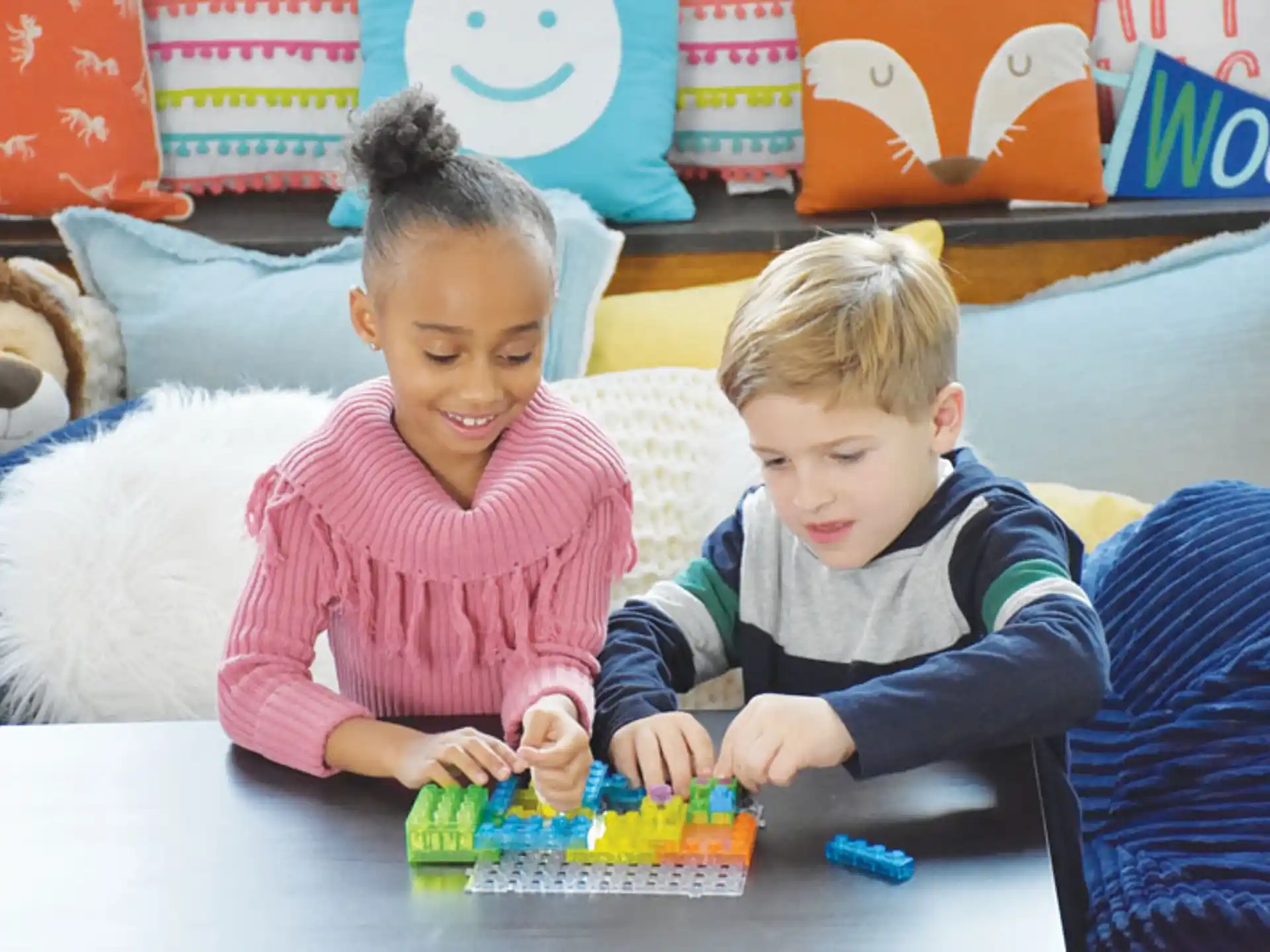 a couple of kids playing with toys