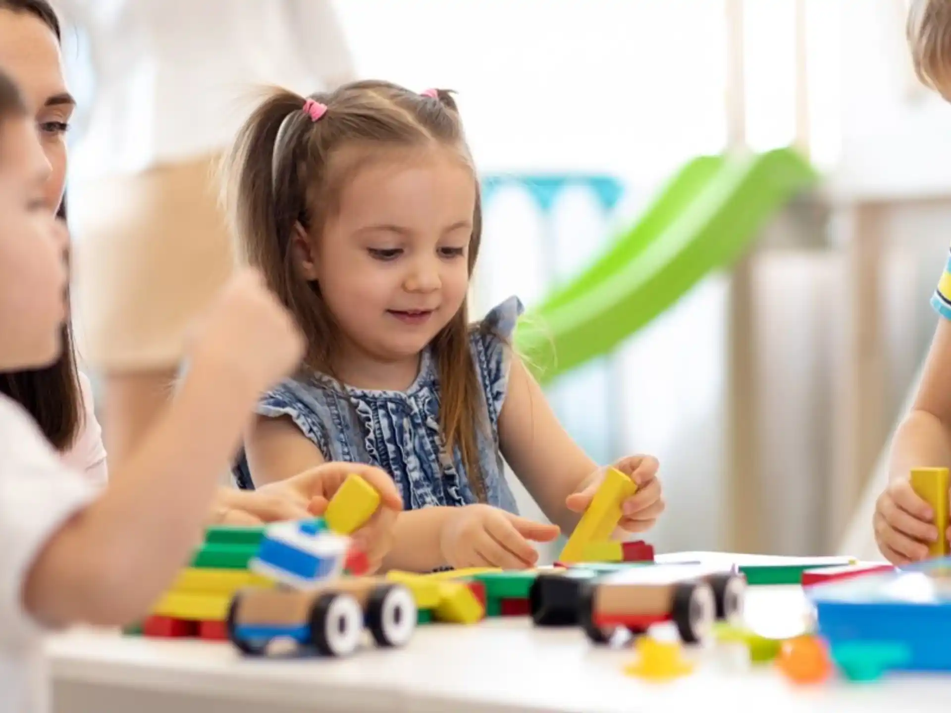 a few children playing with toys