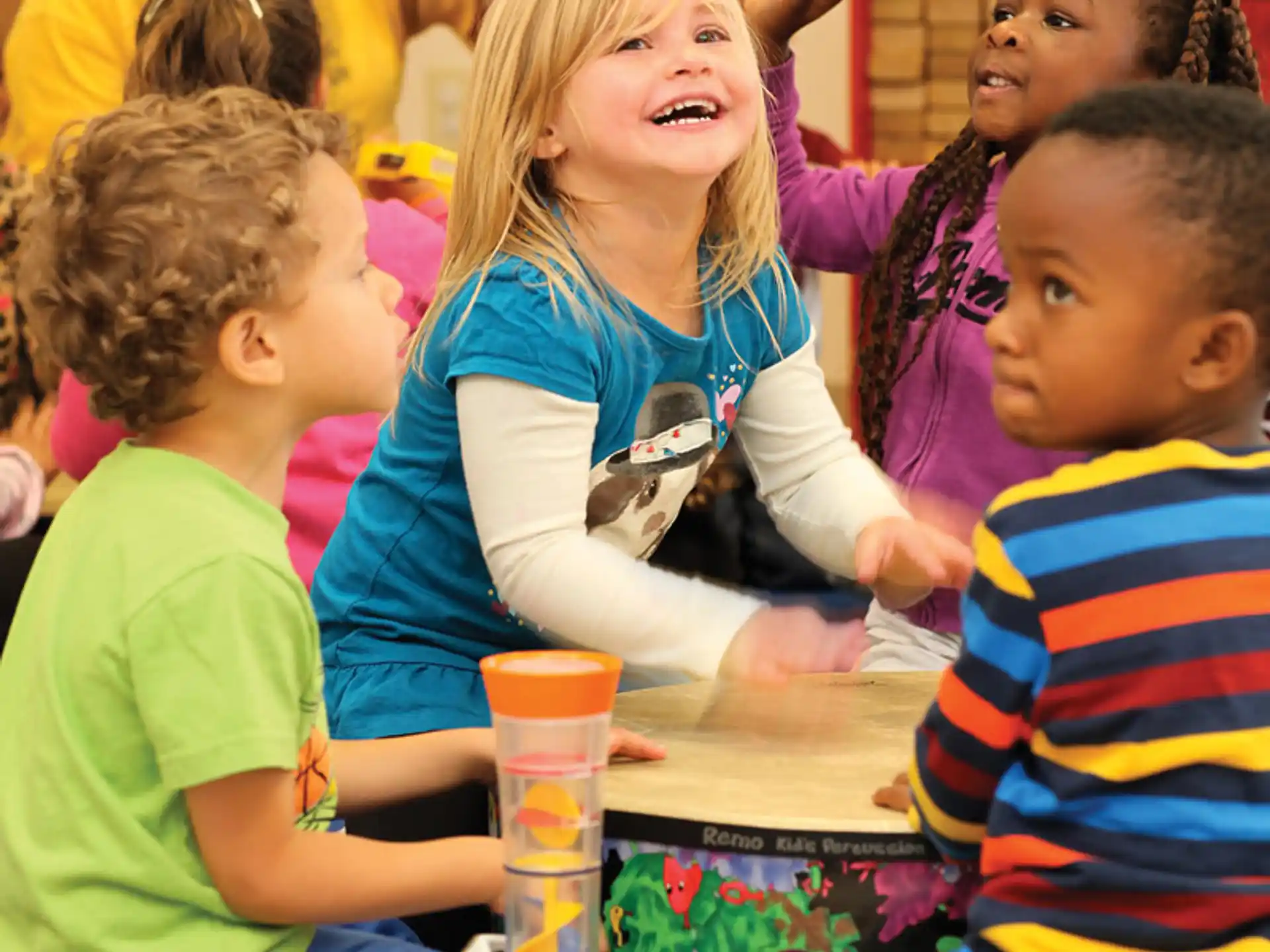 a group of children playing with toys