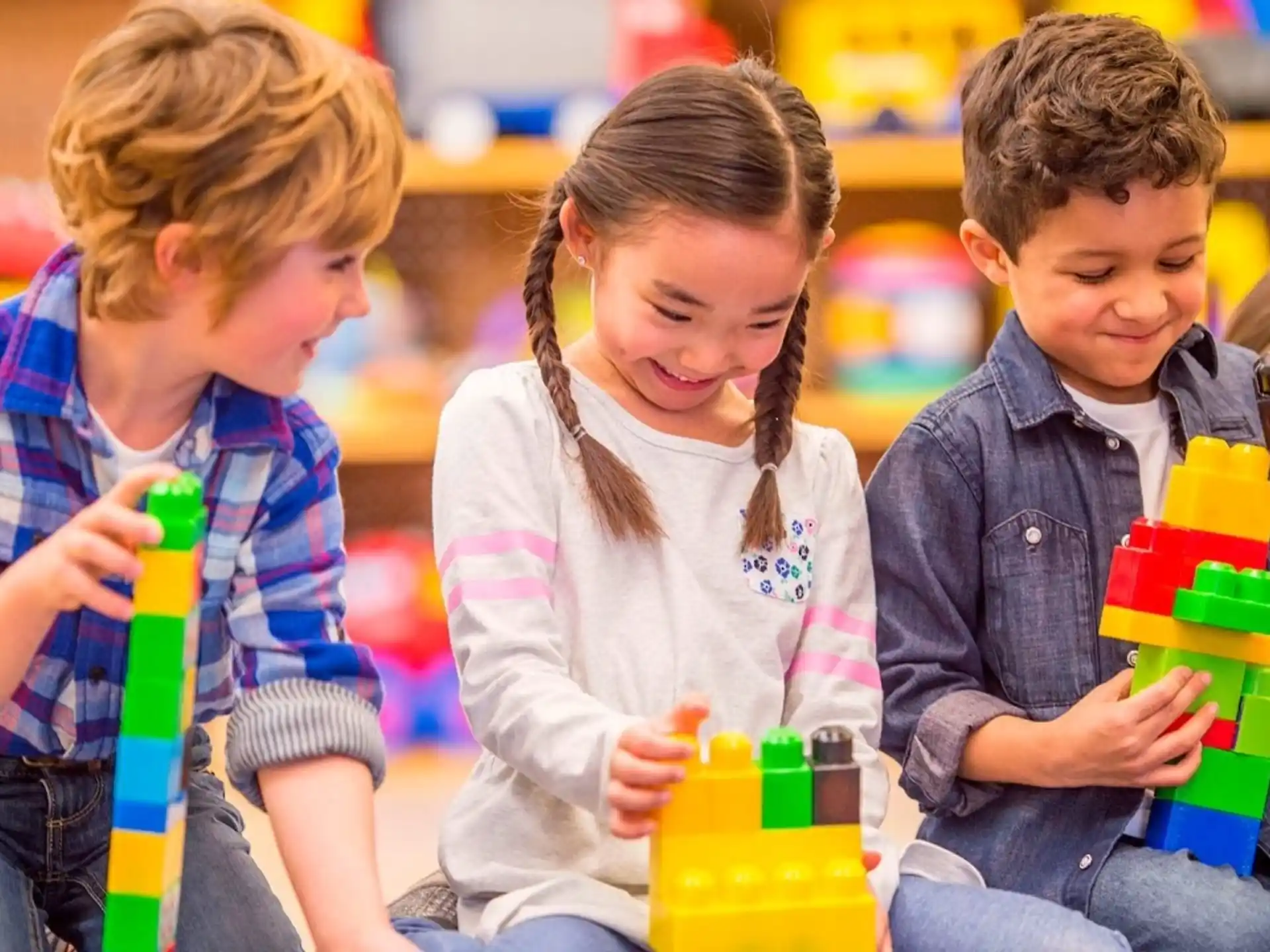a group of children playing with toys
