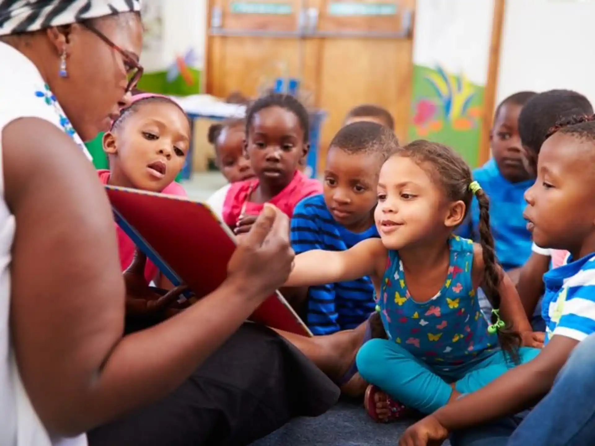 a person and a group of children