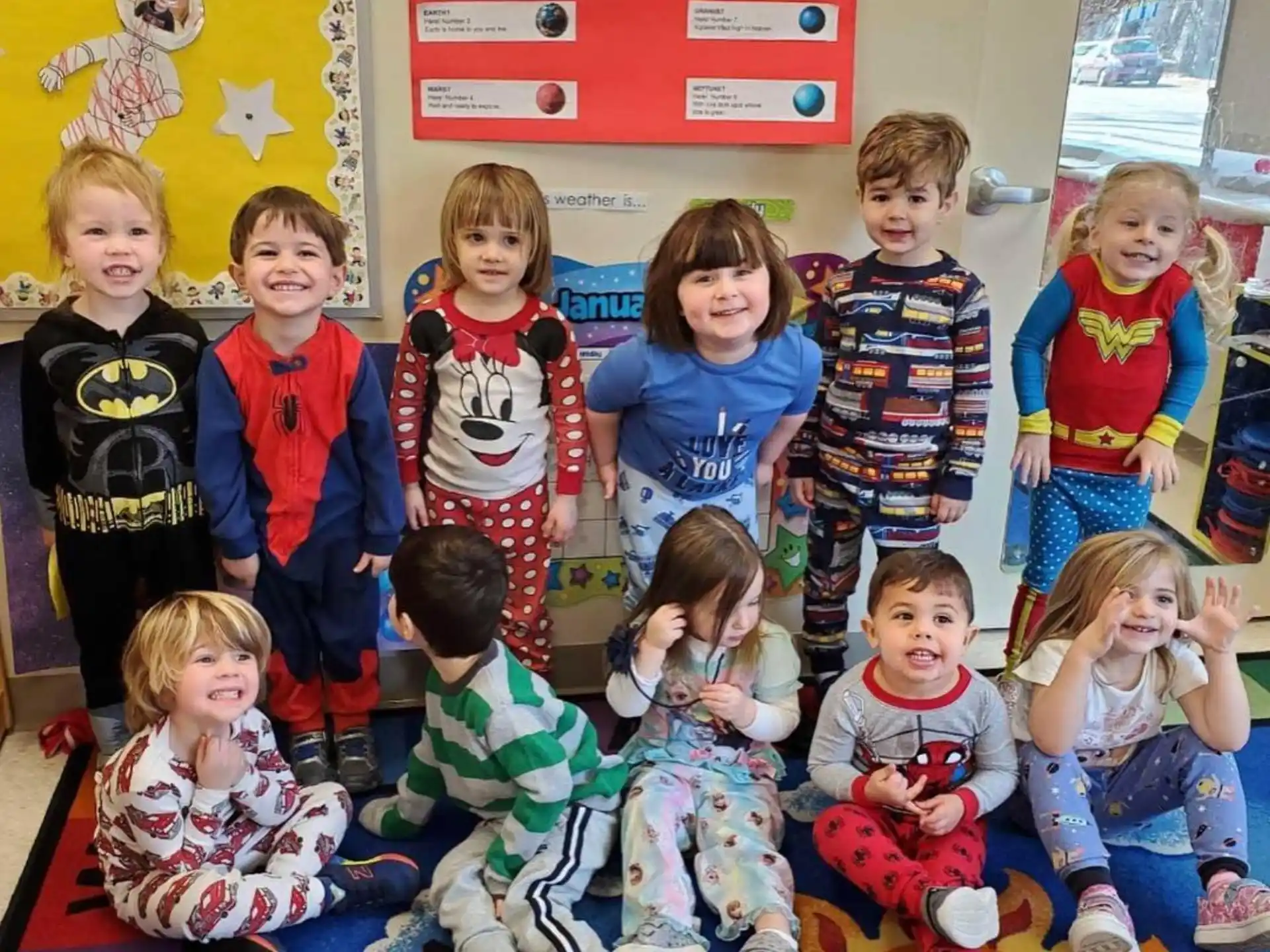 a group of children posing for a photo