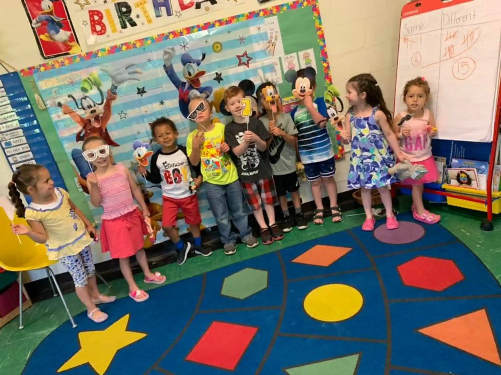 a group of children posing for a photo