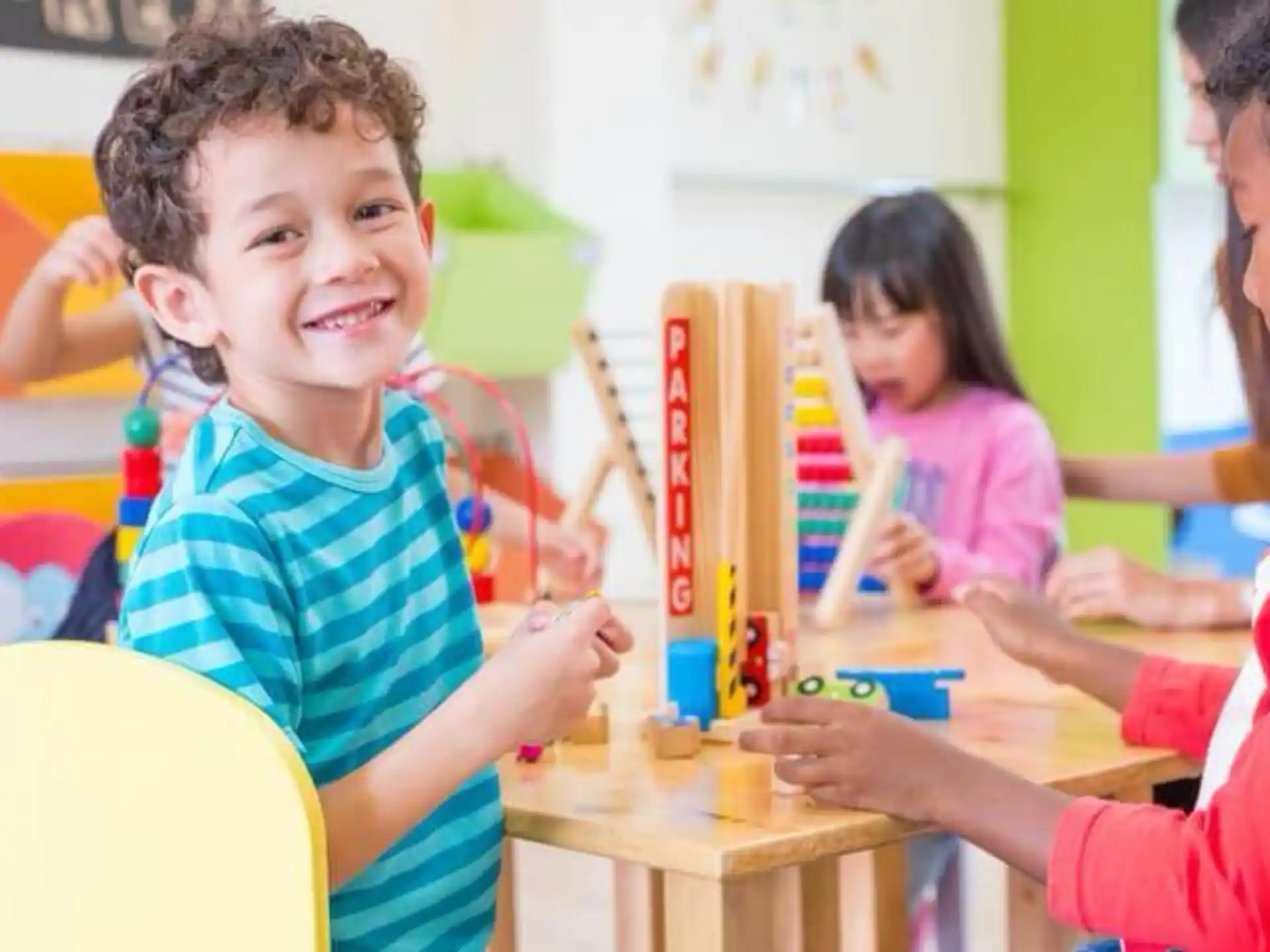 a few children playing with toys