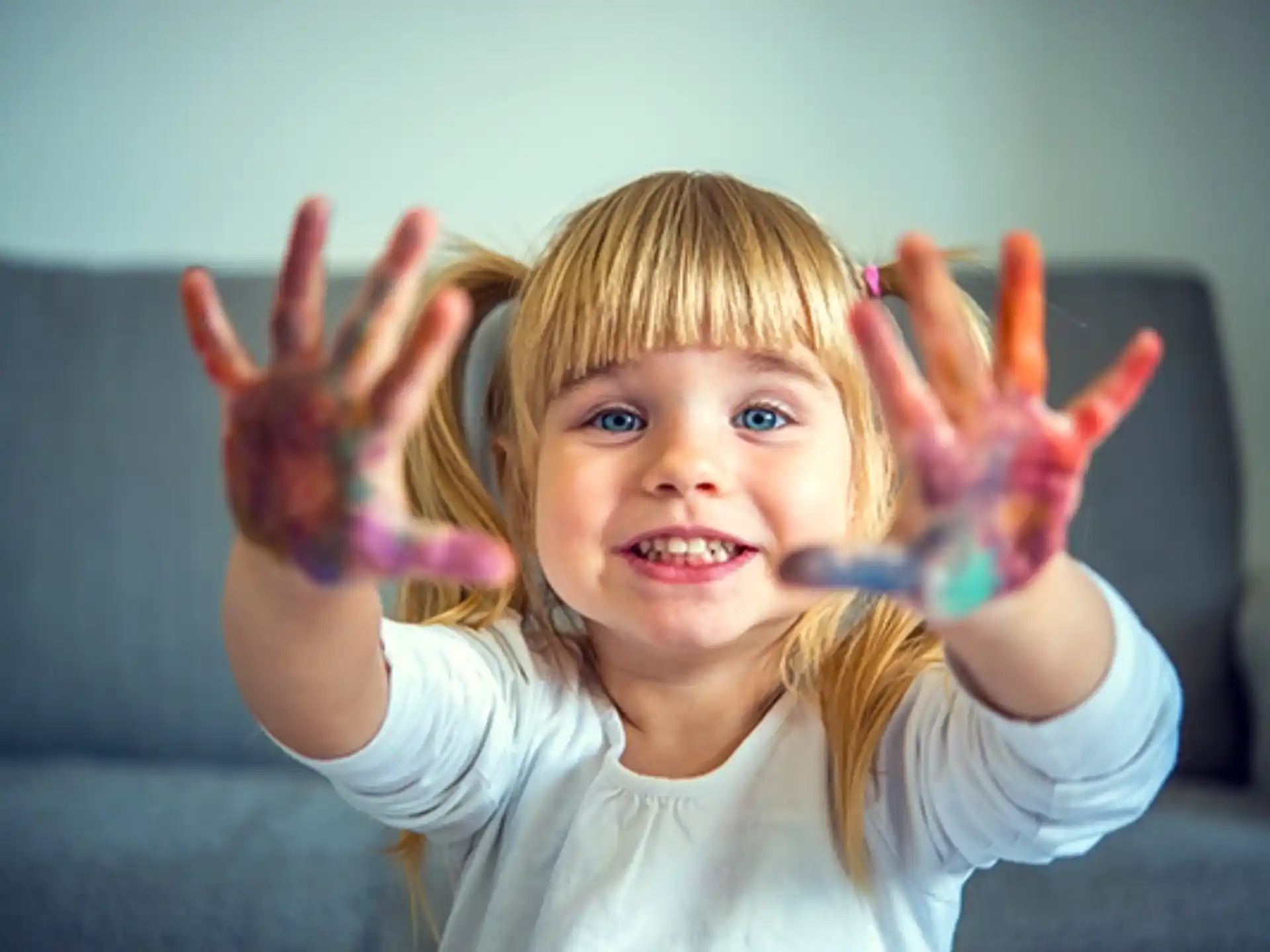 a girl with her hands up