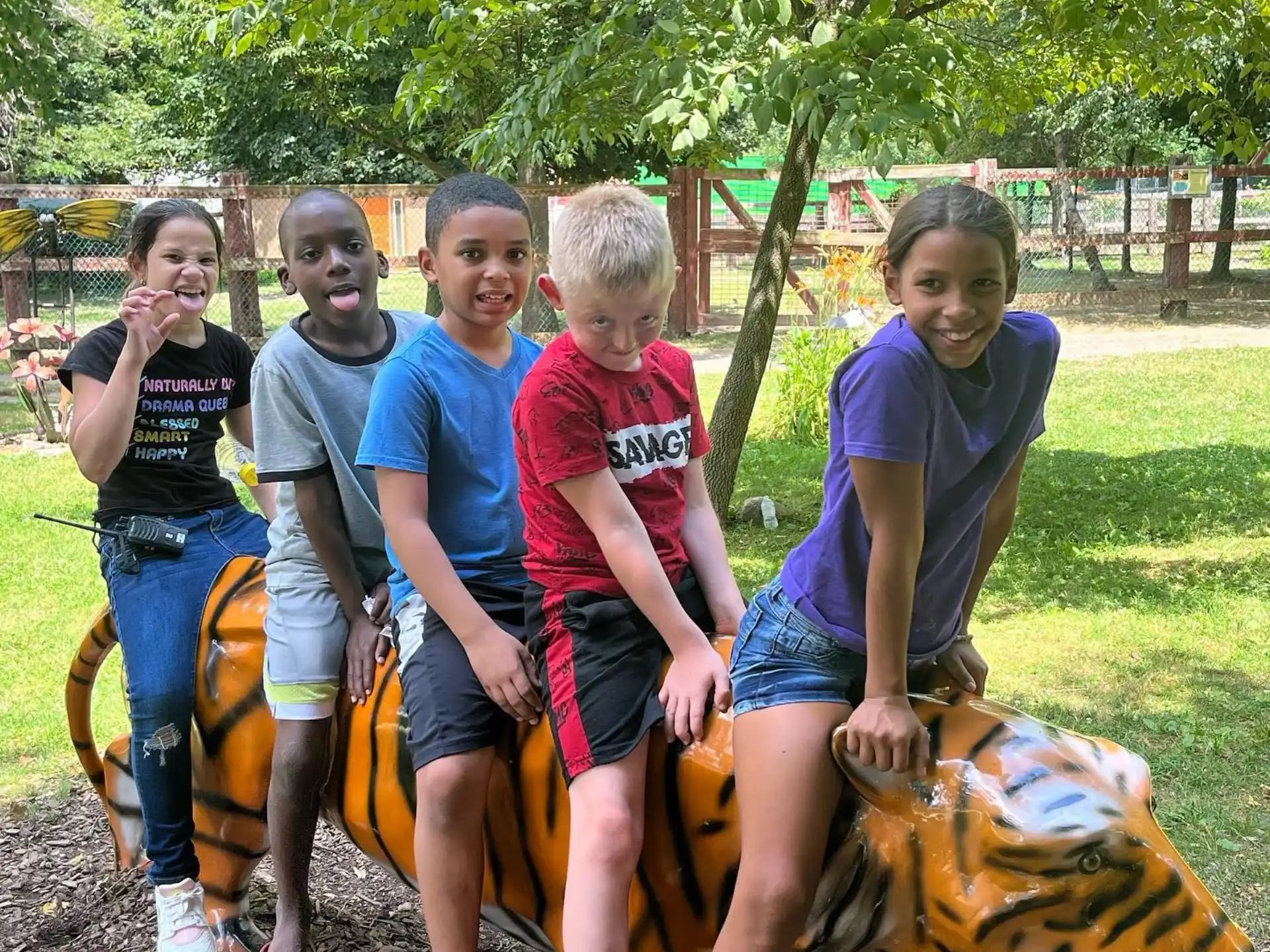 a group of kids posing for a picture