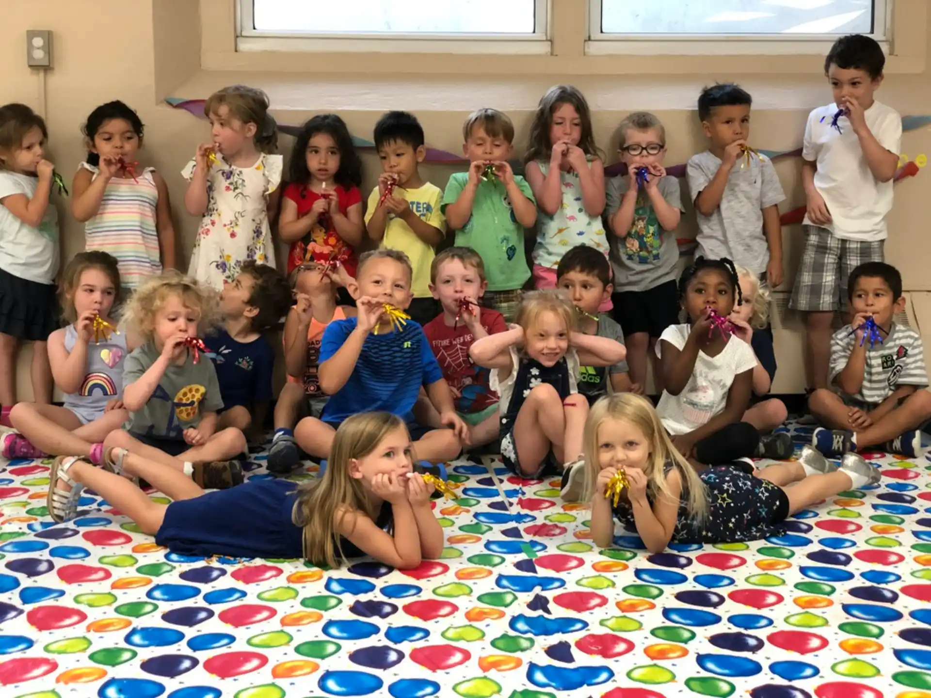 a group of children posing for a photo