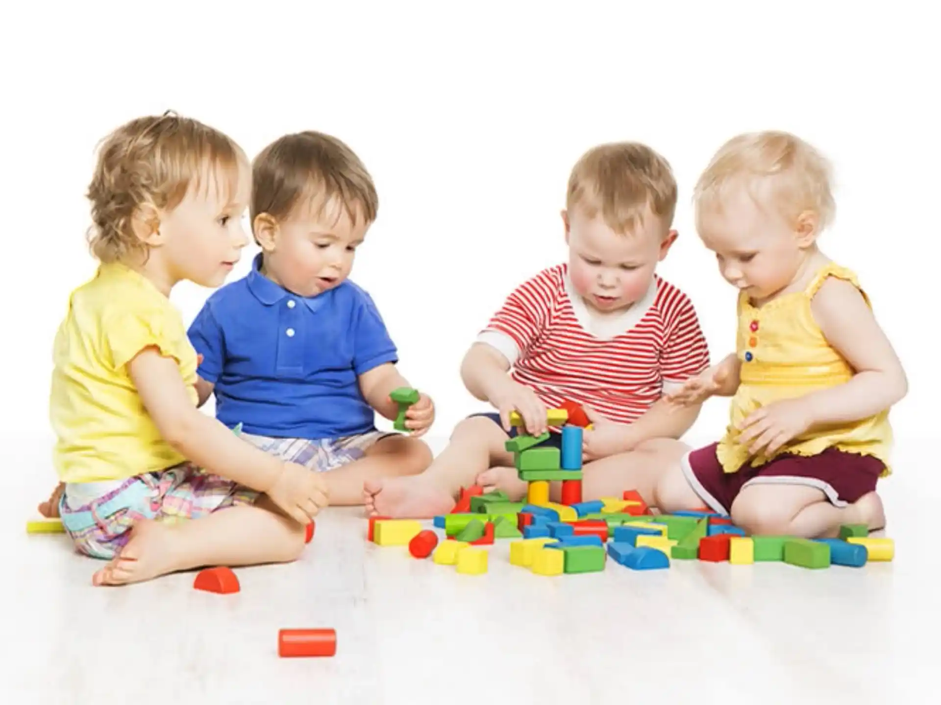 a group of children playing with toys