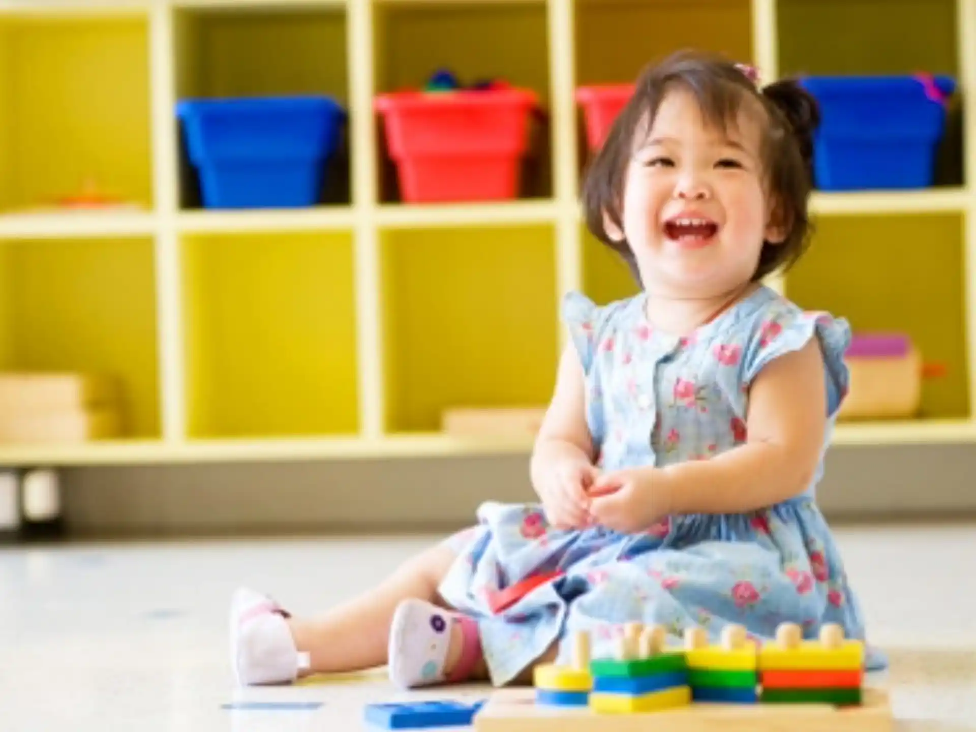 a baby sitting on the floor