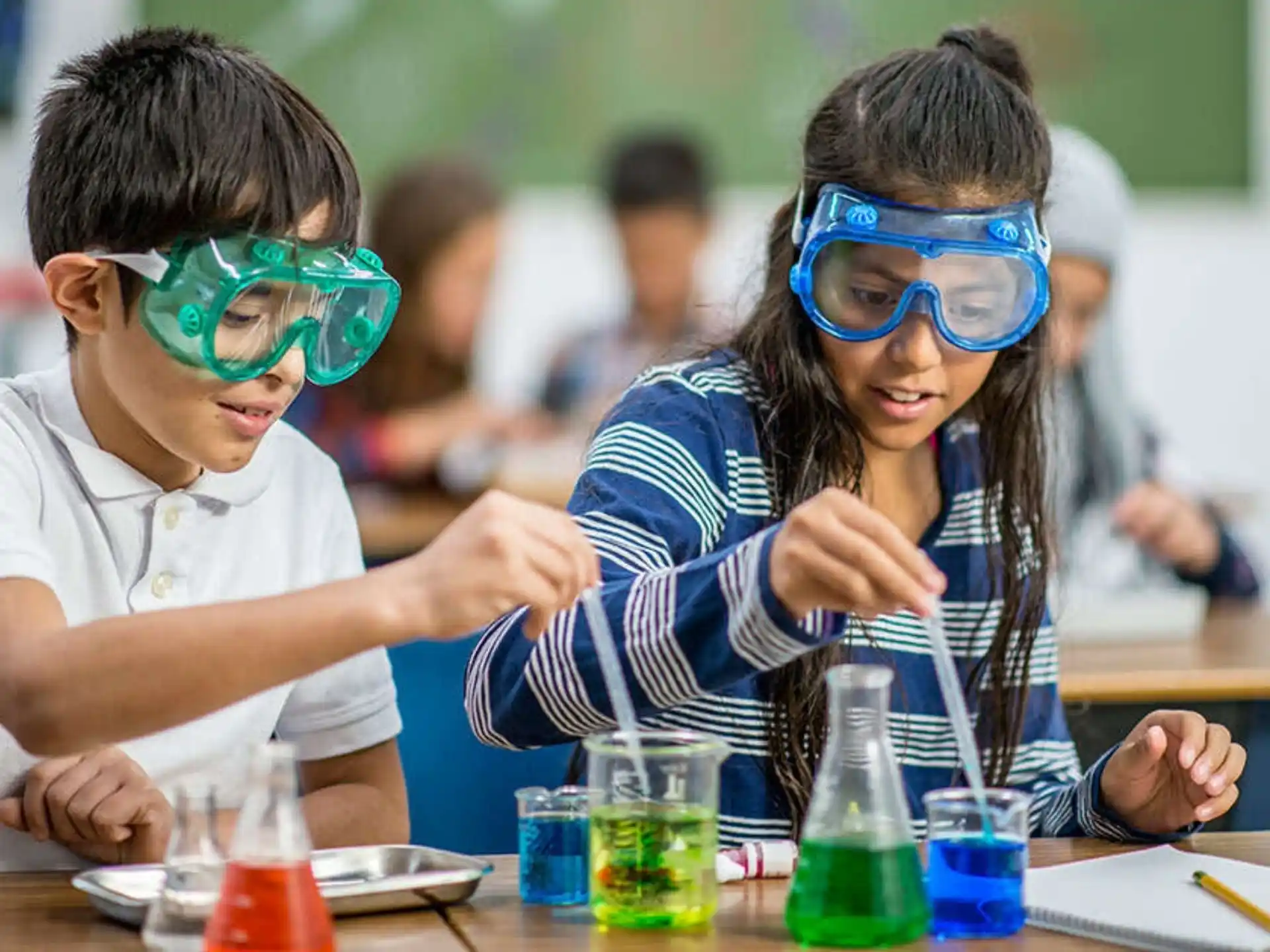 a couple of kids wearing goggles