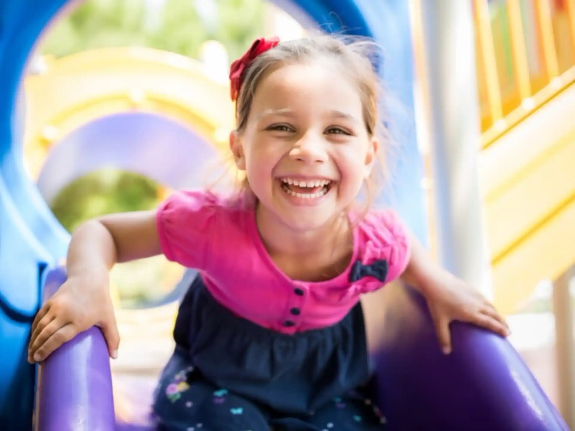 a girl smiling at the camera