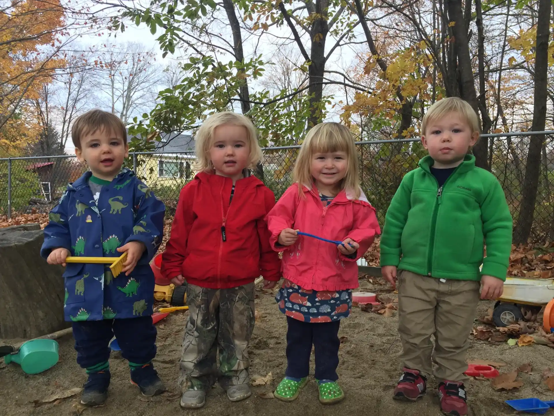 a group of children holding bows and arrows
