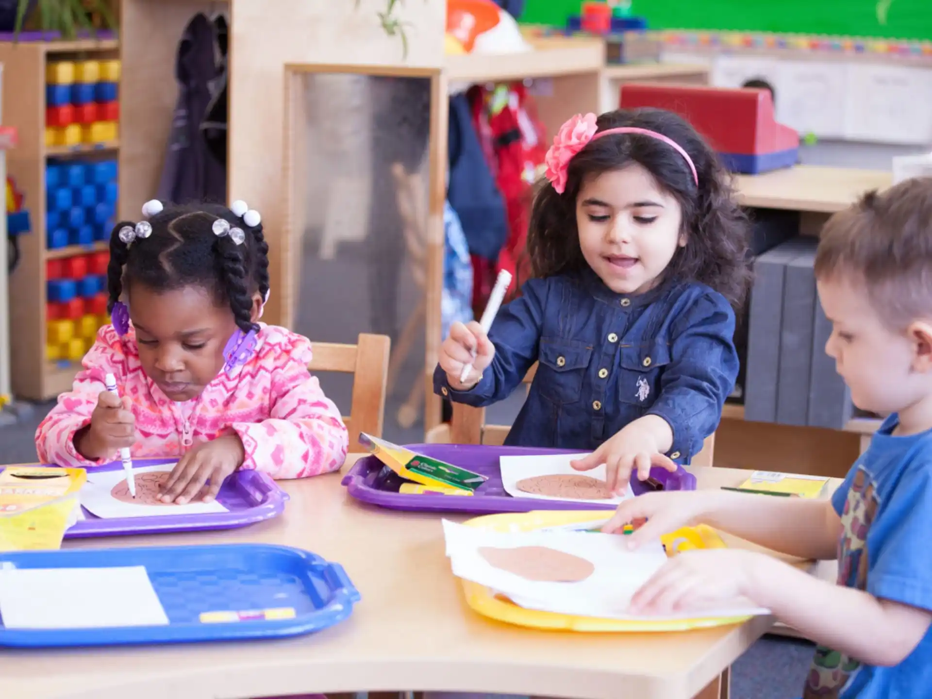 children sitting at a table