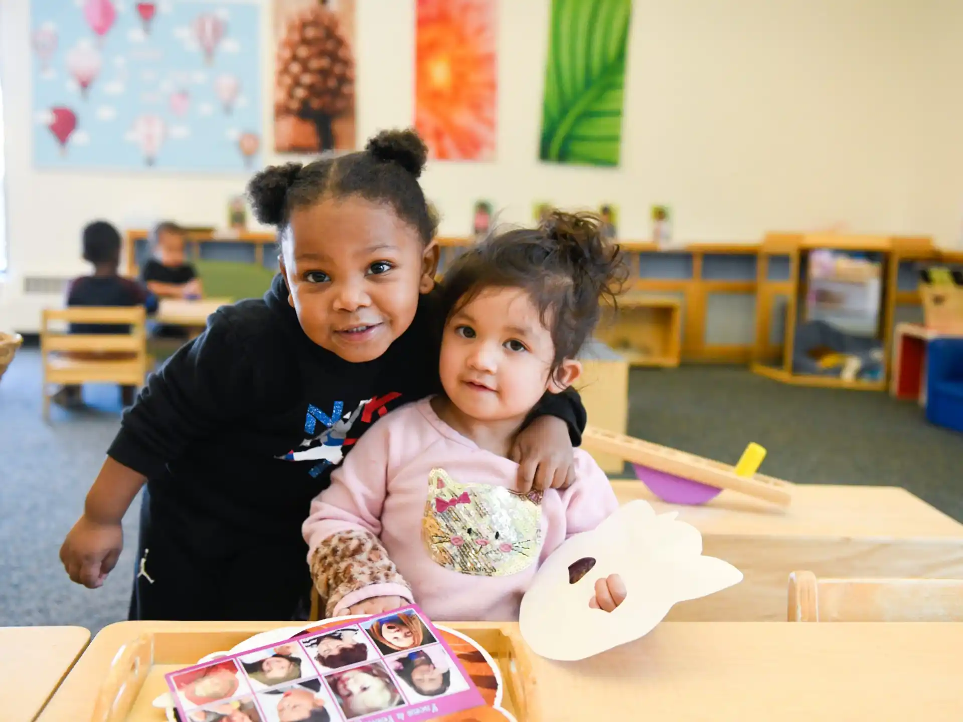 a boy and girl in a classroom