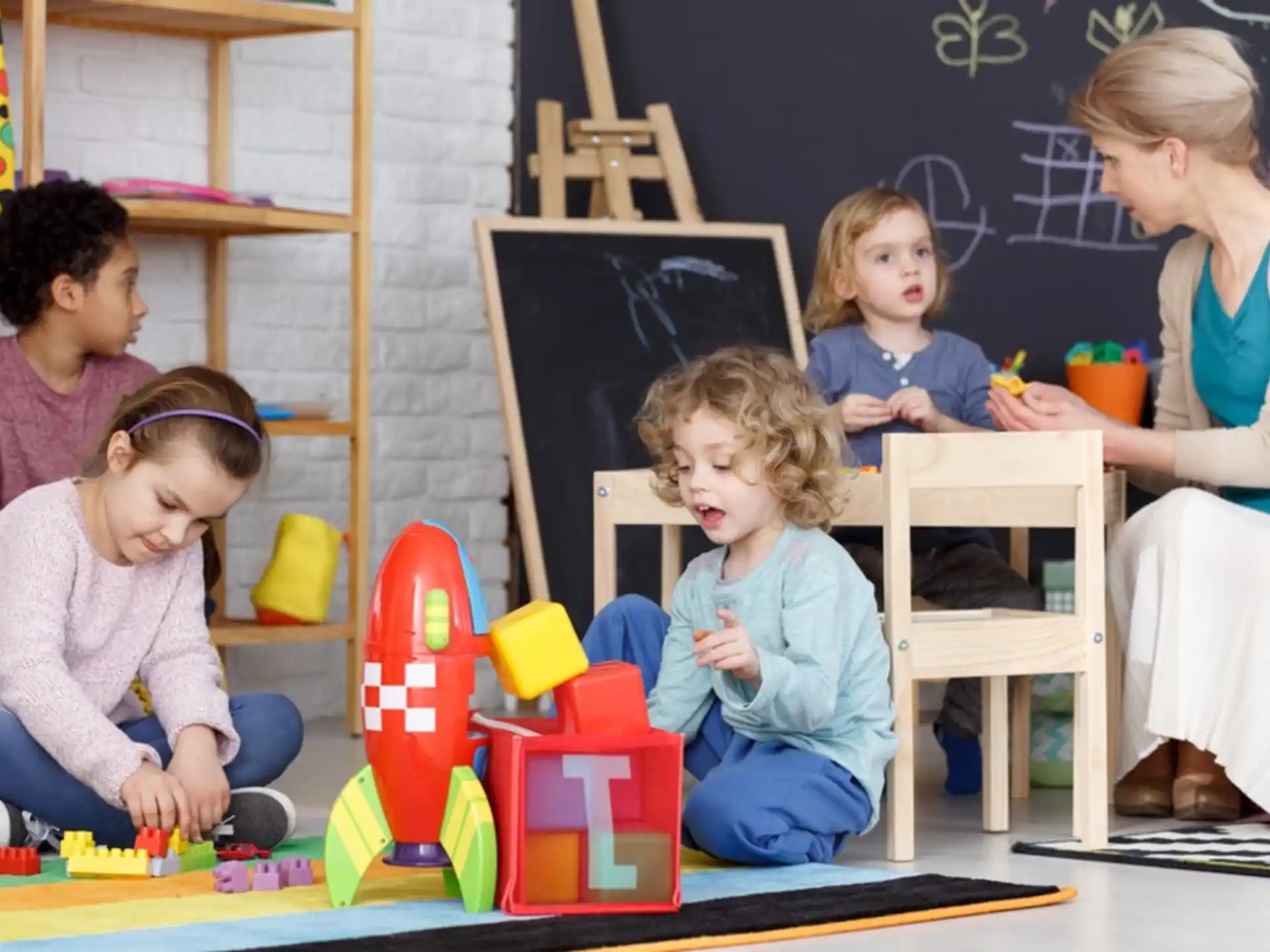 a group of children playing with toys