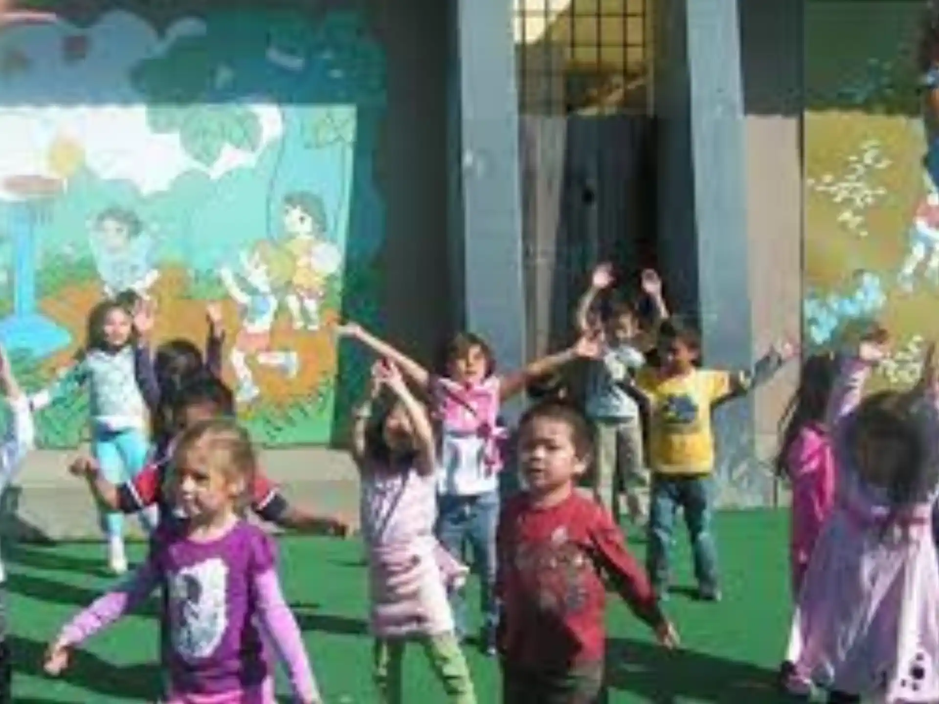 a group of children dancing