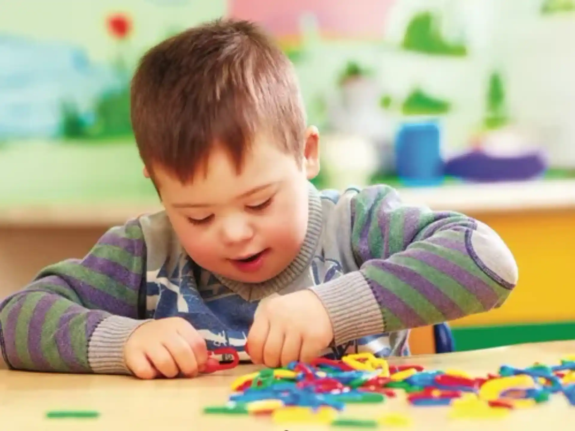 a baby playing with toys