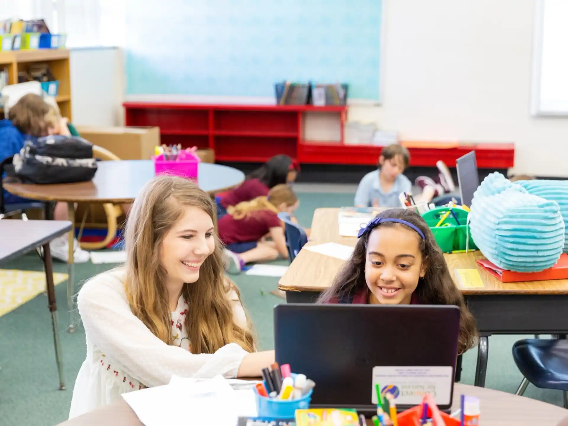 a group of children in a classroom