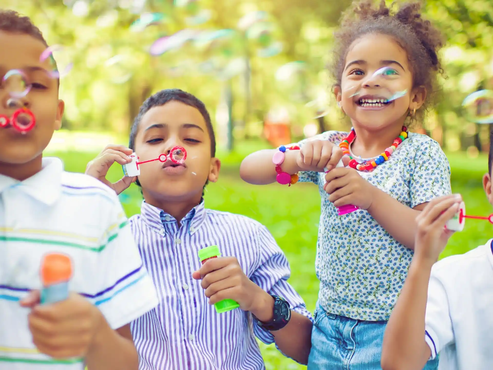 a group of kids with bubbles