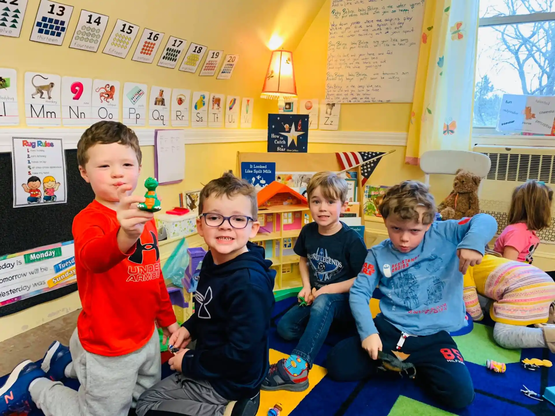 a group of children sitting on the floor