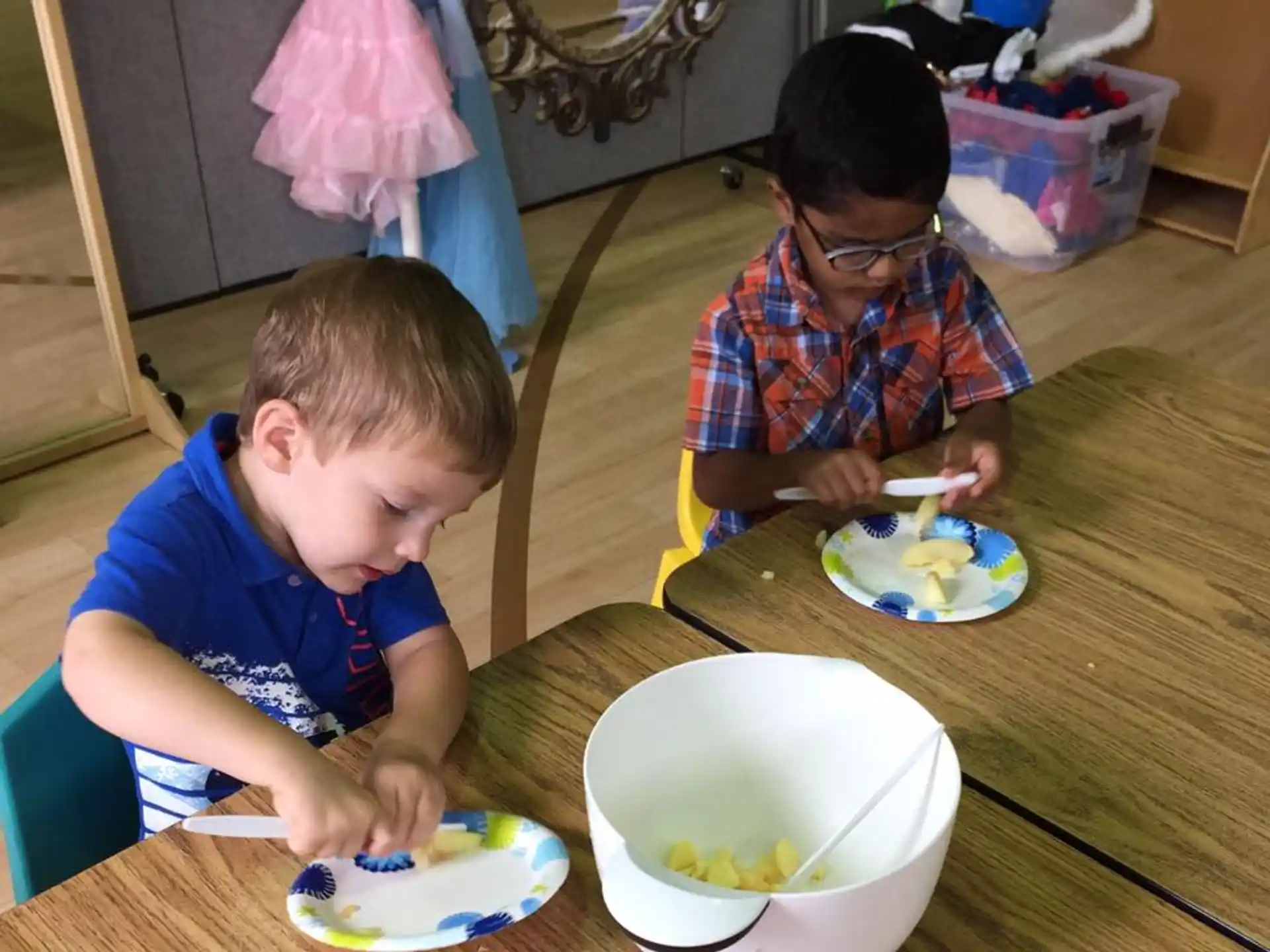 a person and a boy eating