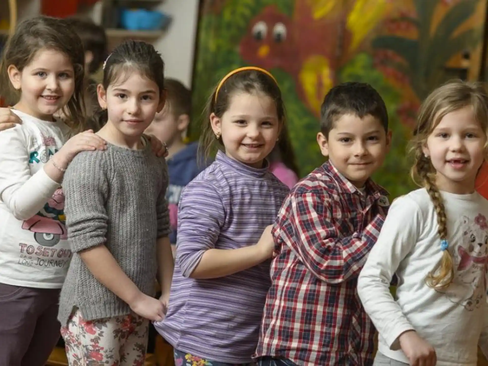 a group of children posing for a photo