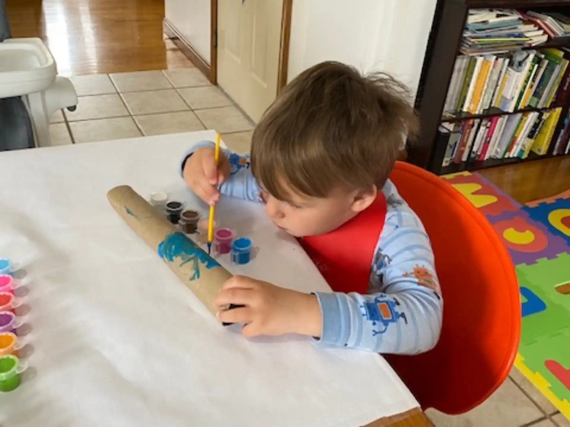 a child sitting at a table