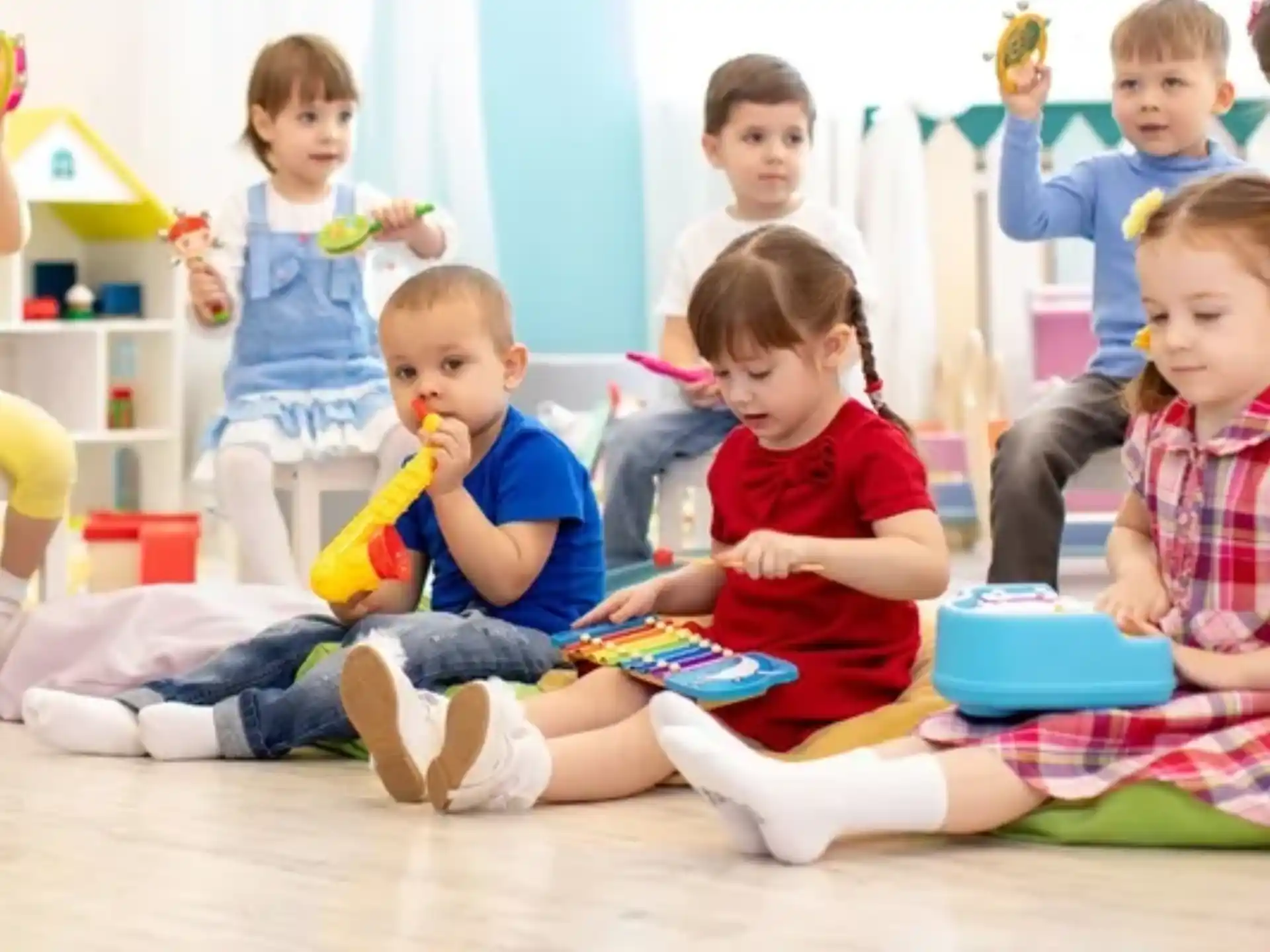 a group of children sitting on the floor