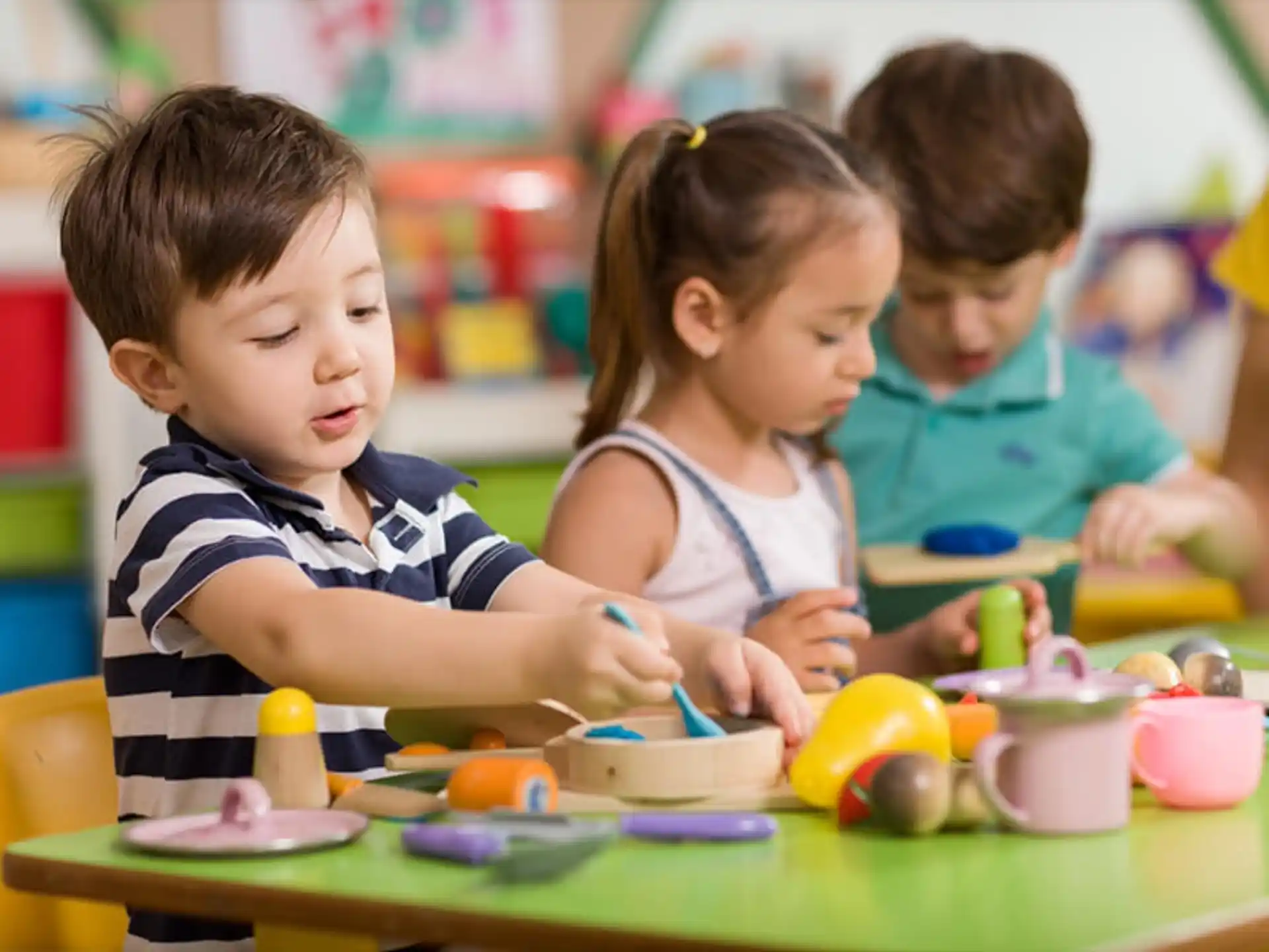 a few children playing with toys