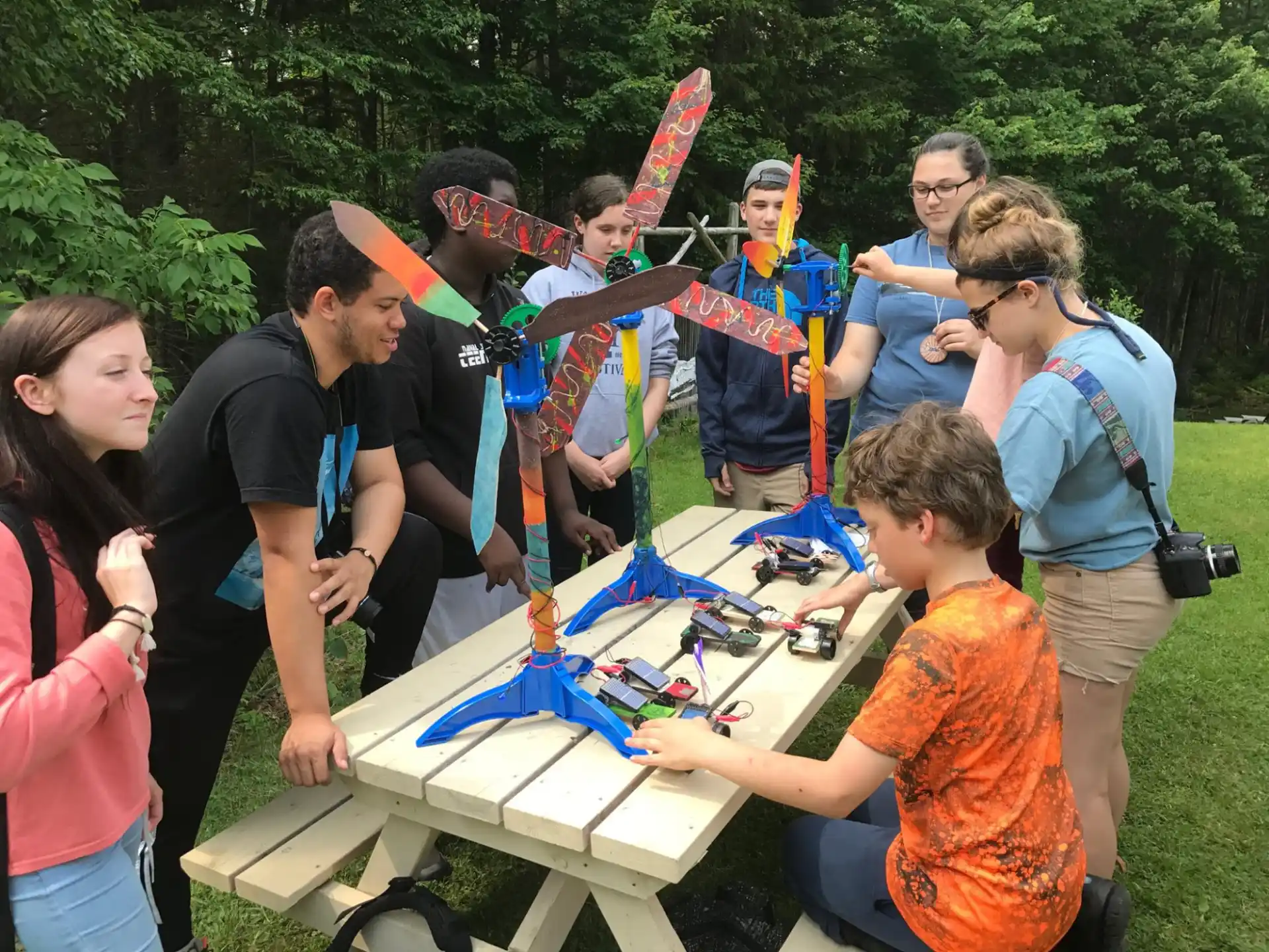a group of people around a table