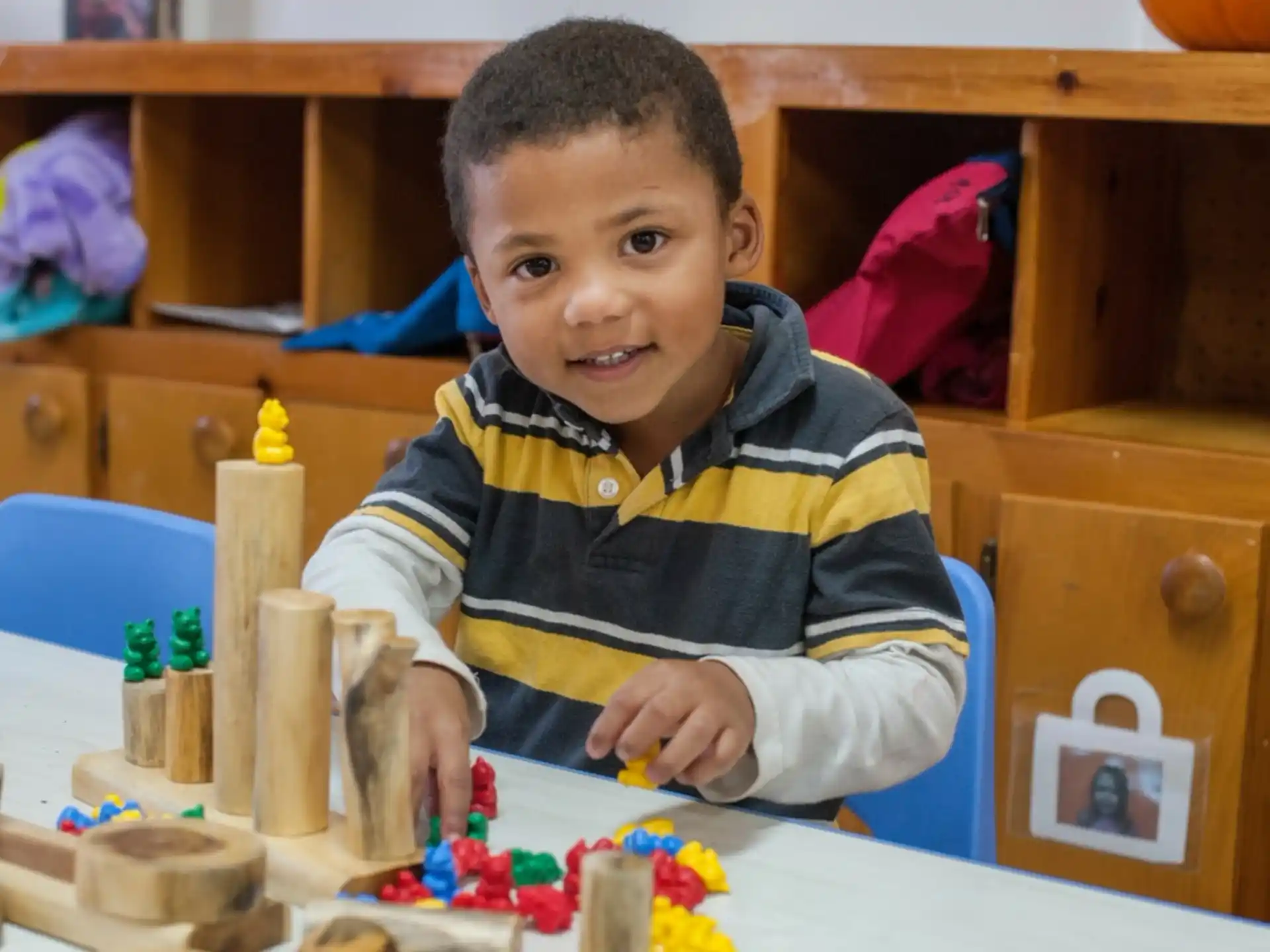 a boy sitting at a table