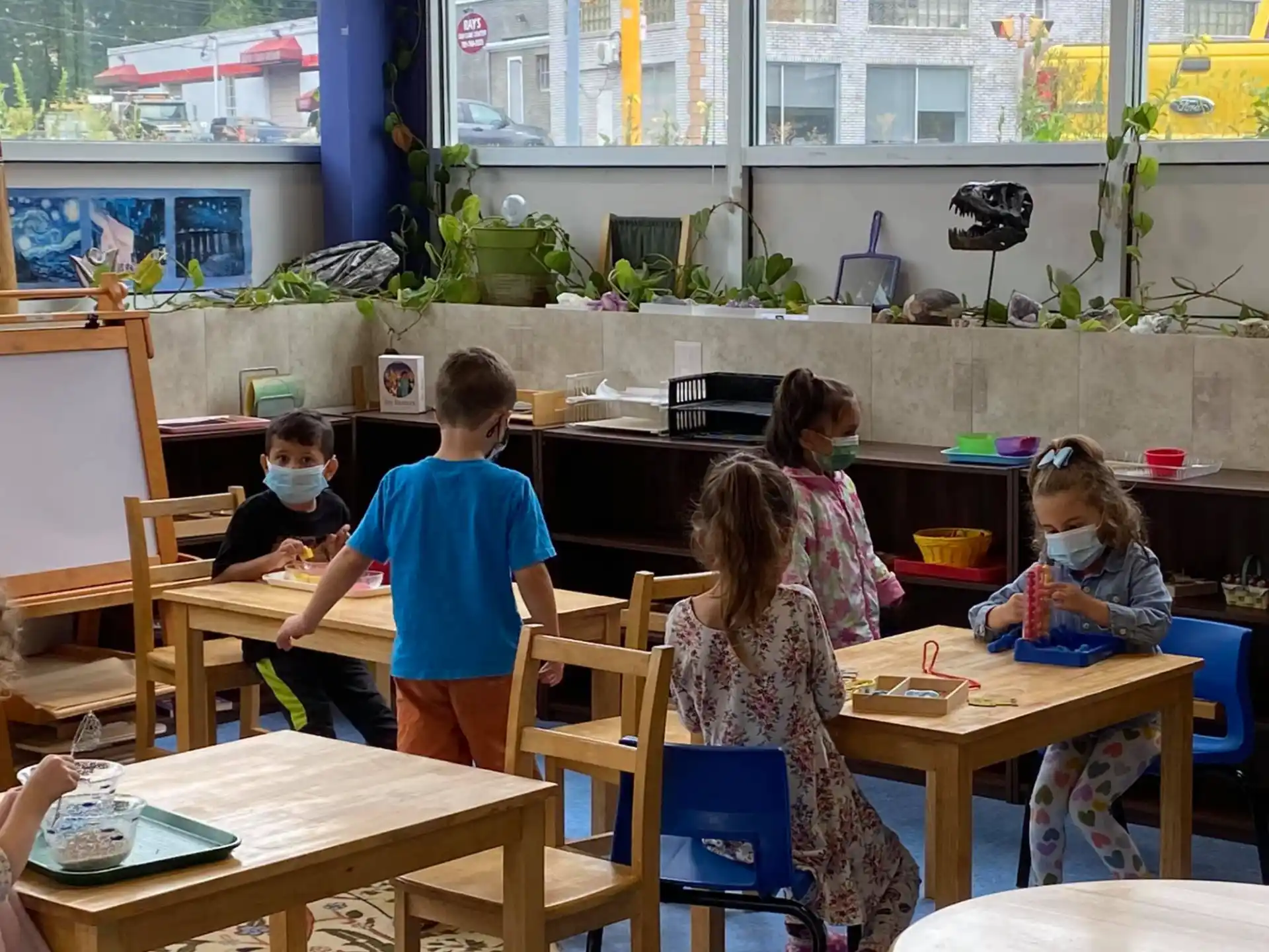 a group of children sitting at tables