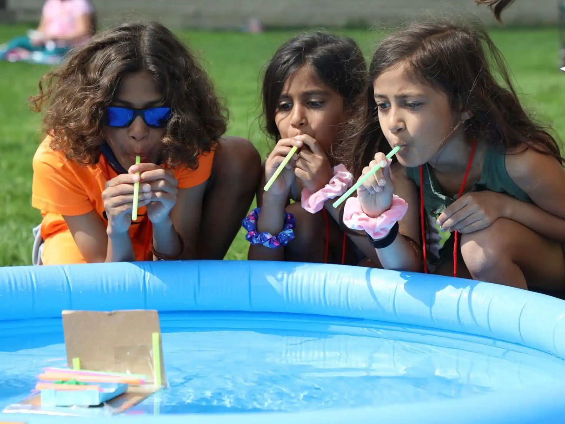 a group of girls eating ice cream