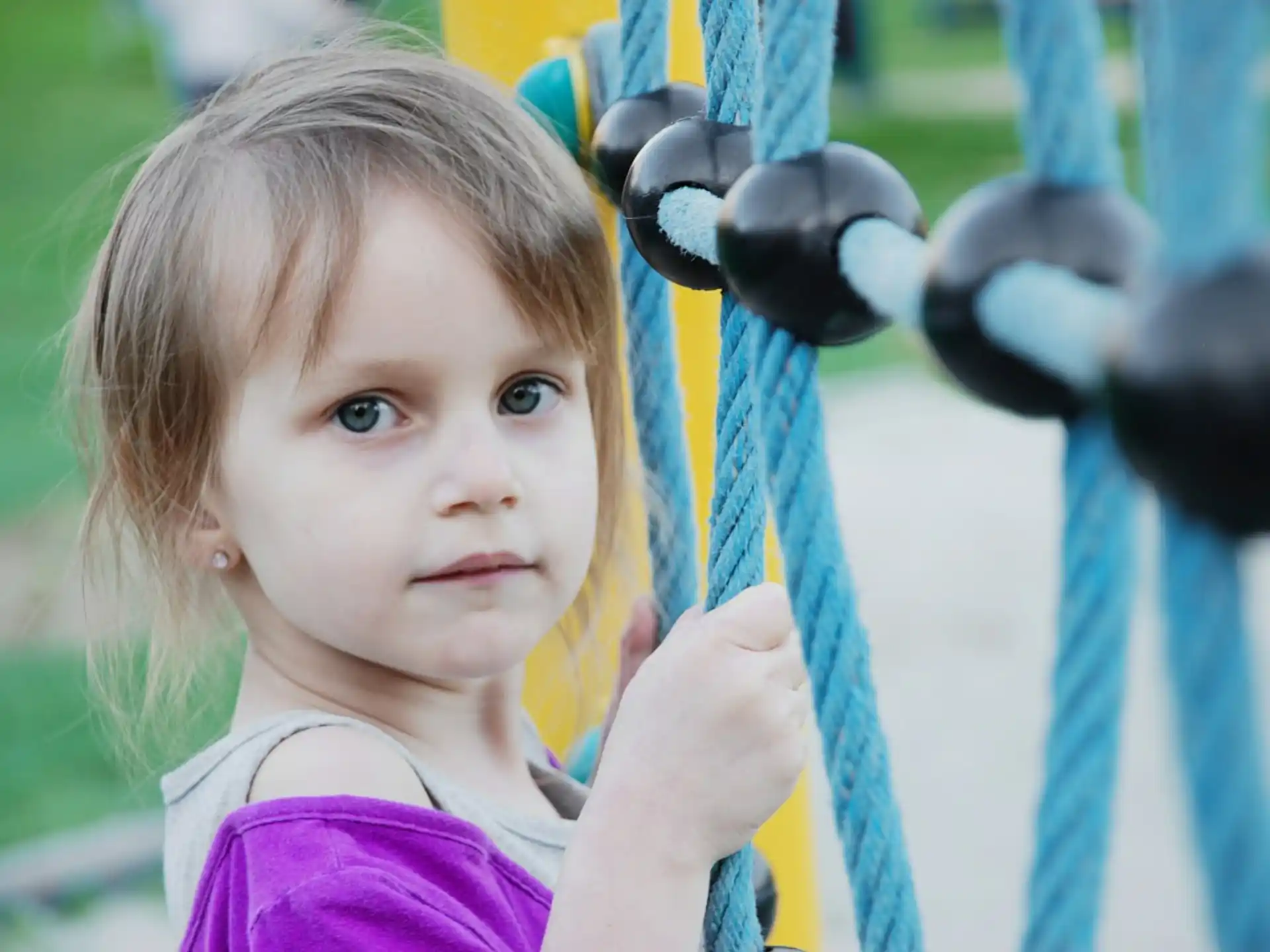 a little girl on a swing