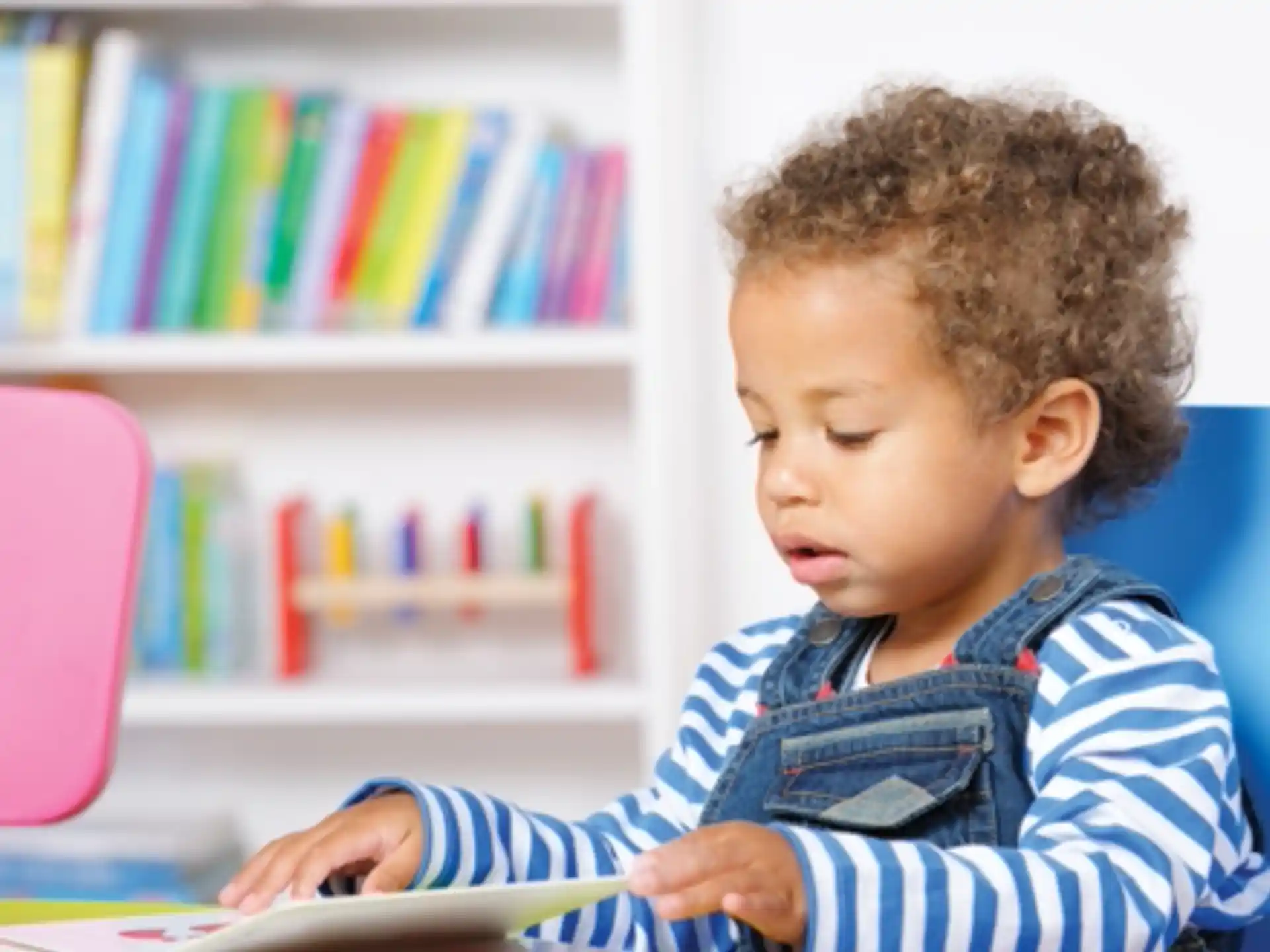 a baby reading a book